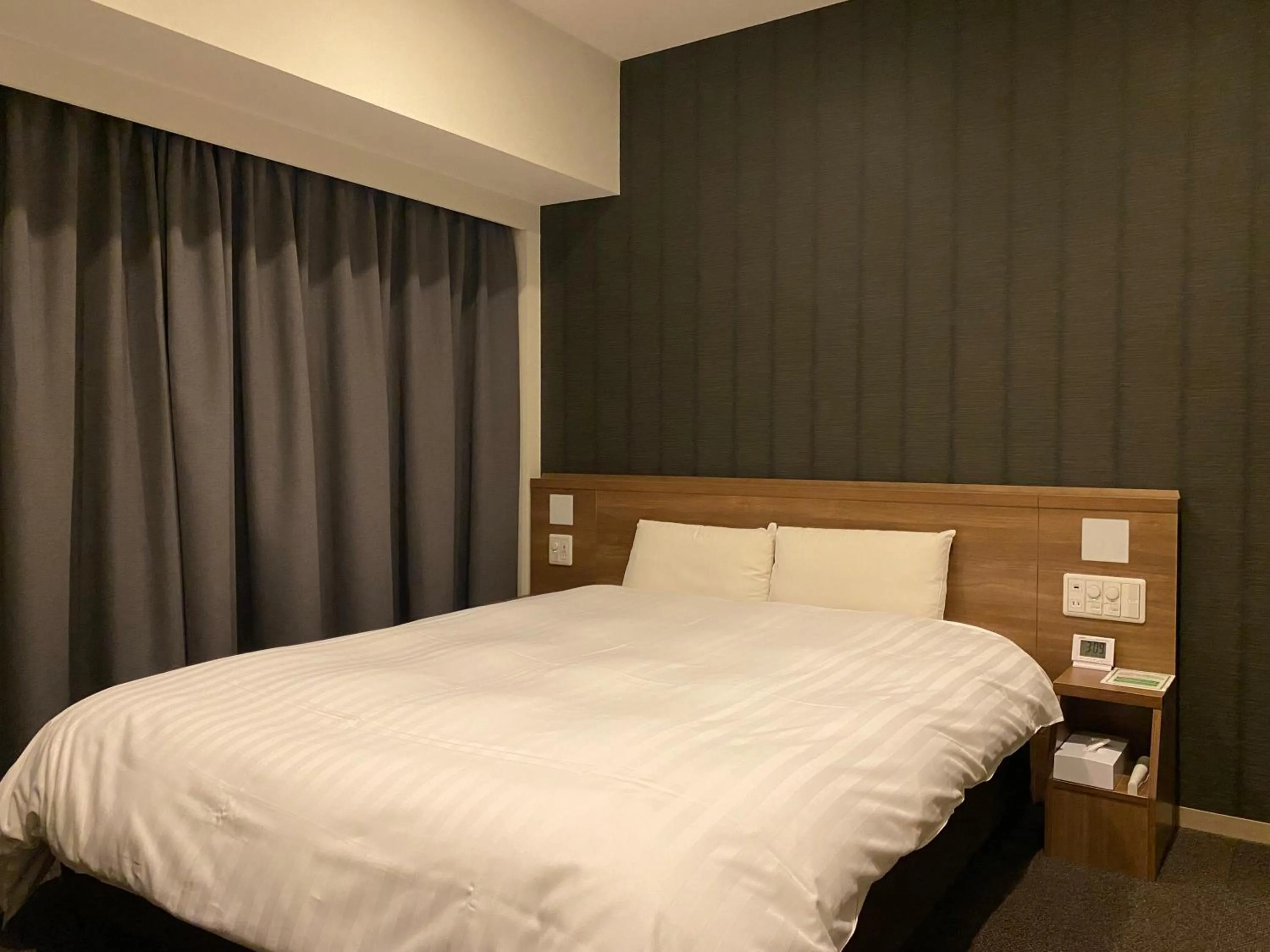 Bed in Dormy Inn Morioka