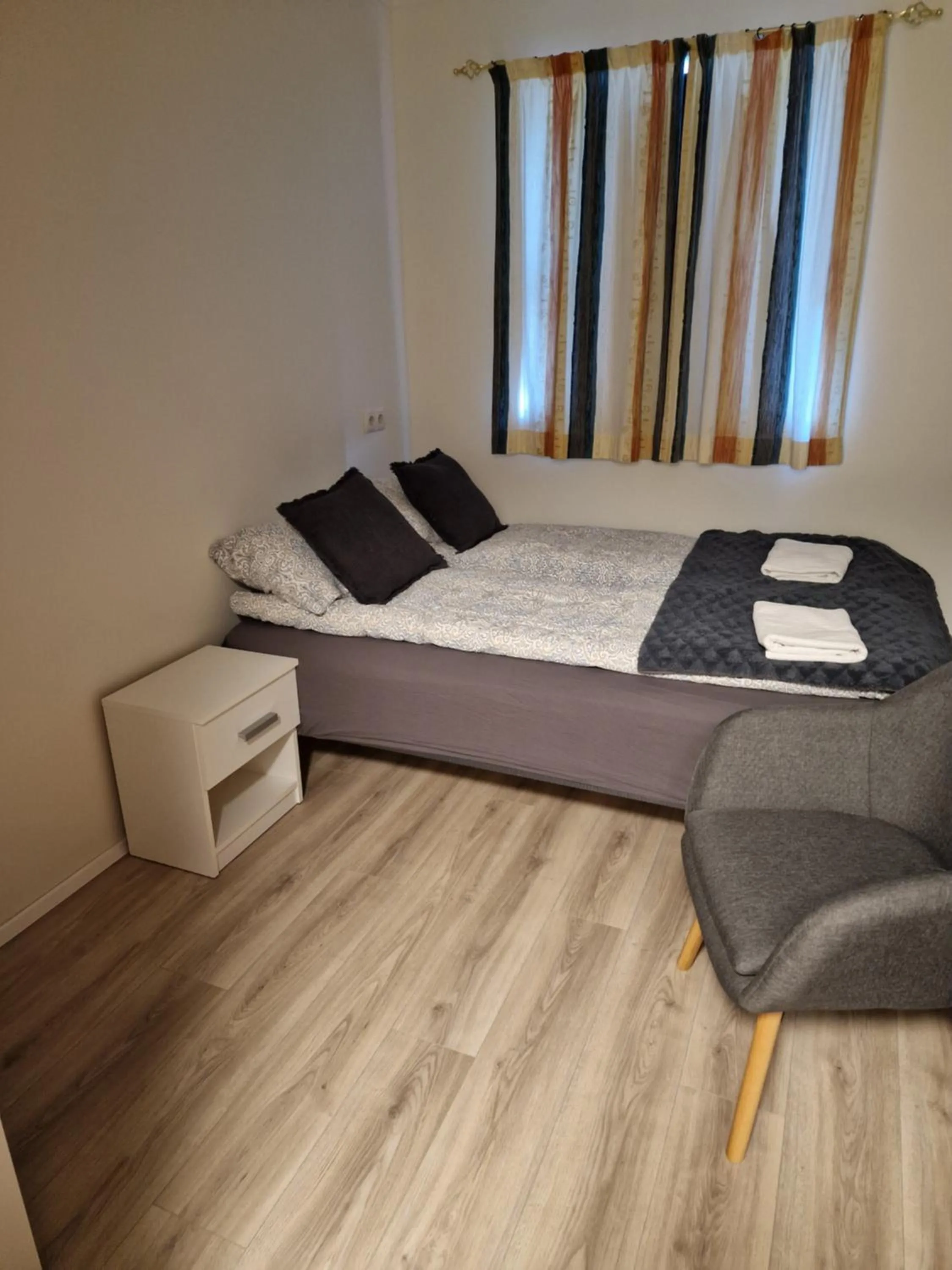 Bed in Húsid Guesthouse