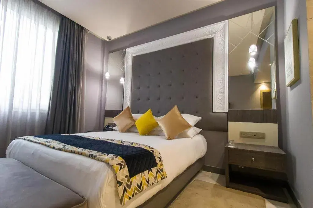 Bed in Mandarin Palace Hotel & Spa Bed in Mandarin Palace Hotel & Spa