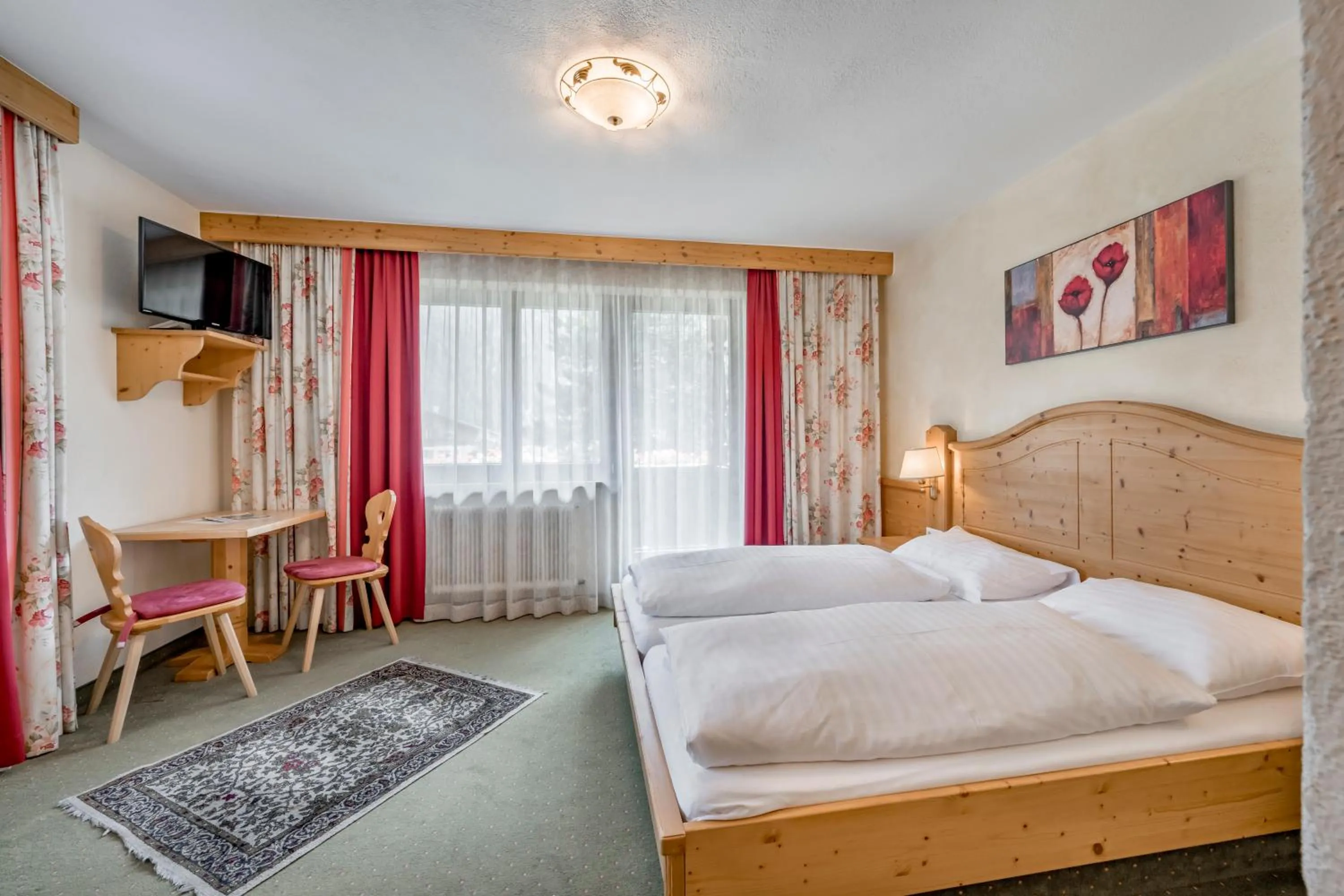 Photo of the whole room, Bed in Pension Almrausch