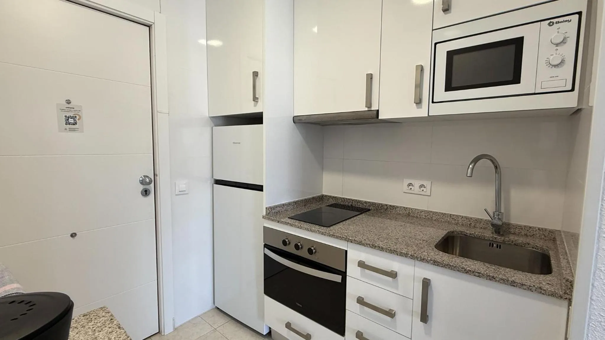 Kitchen or kitchenette in Apartamentos Esmeralda Unitursa