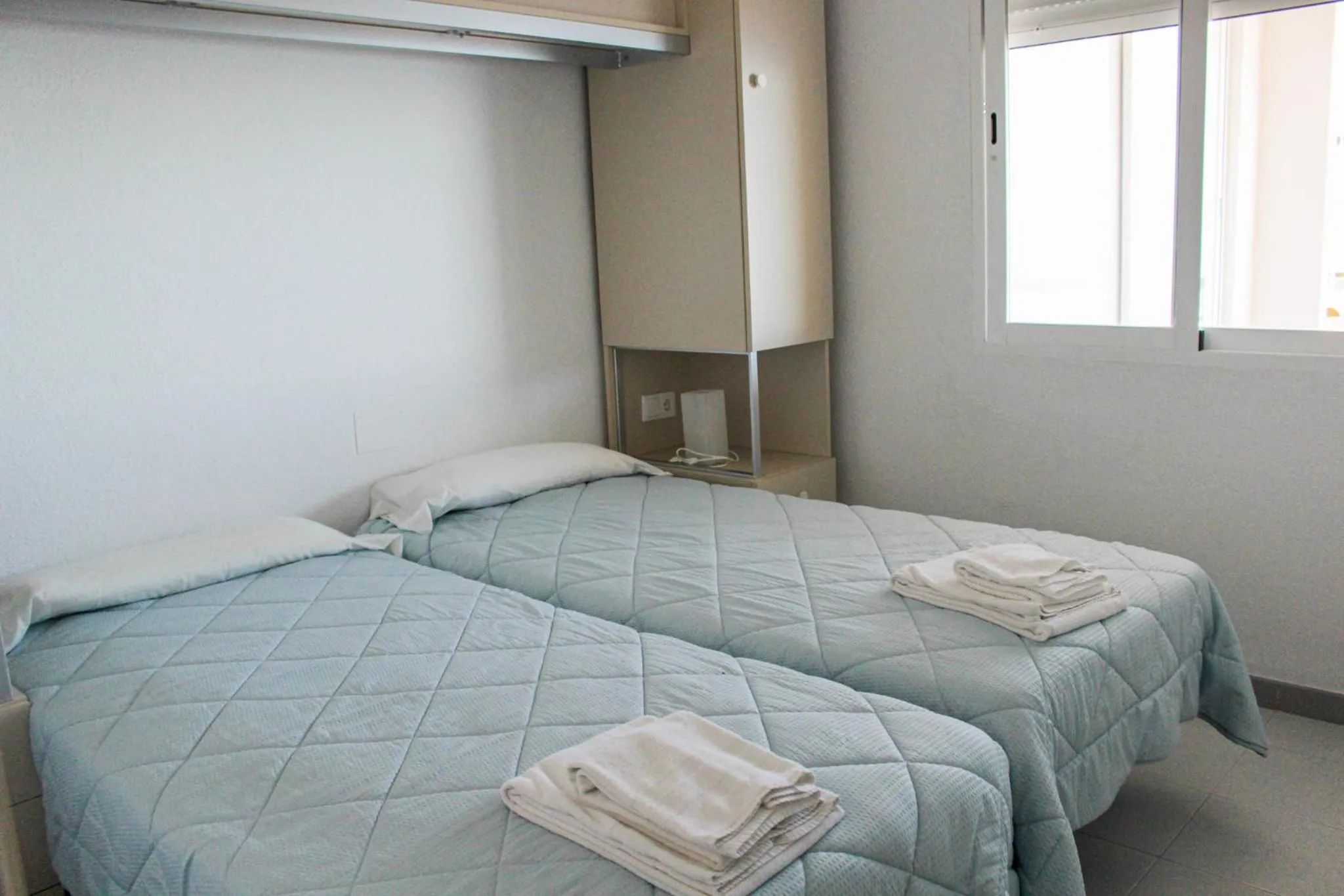 Bed in Apartamentos Esmeralda Unitursa