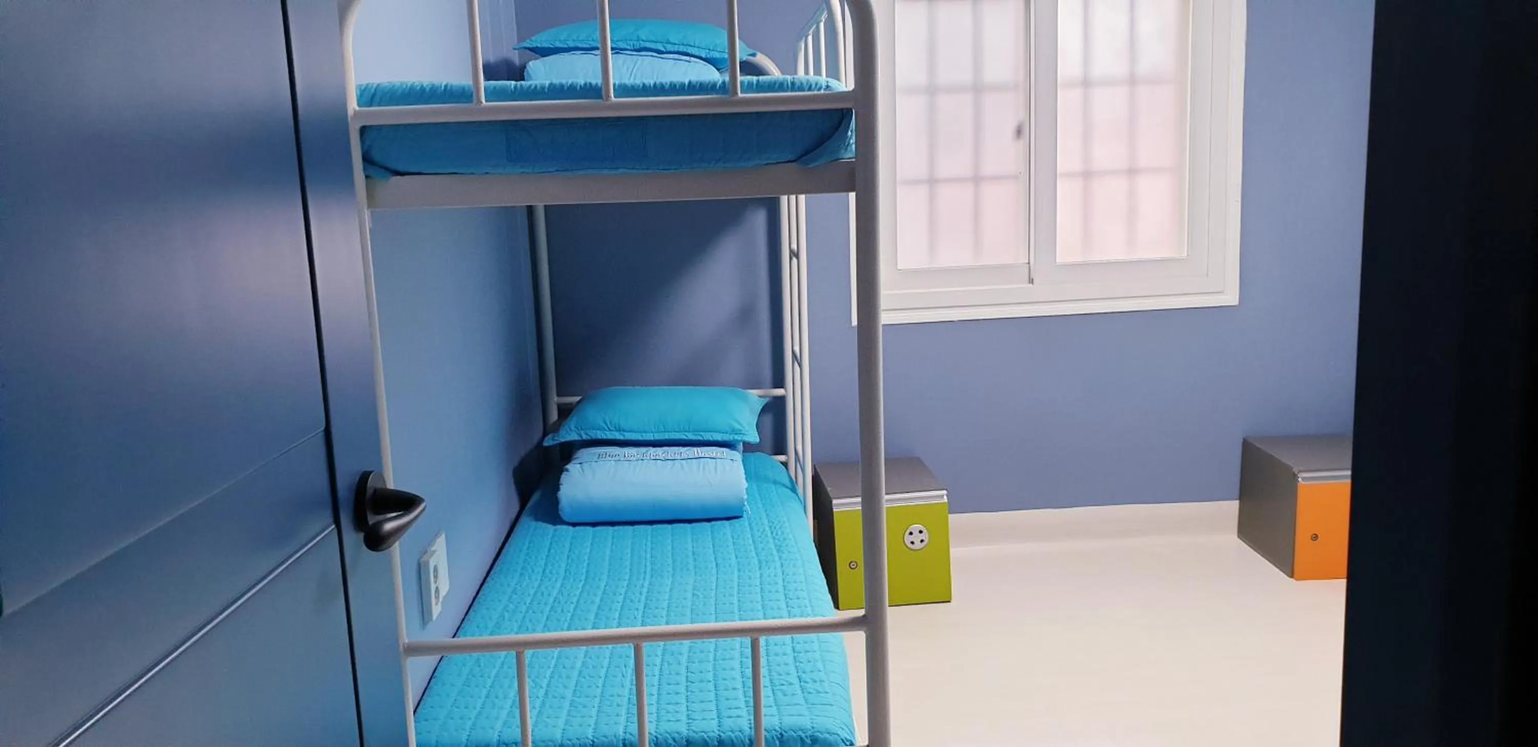 Bed in Blue Backpackers Hostel