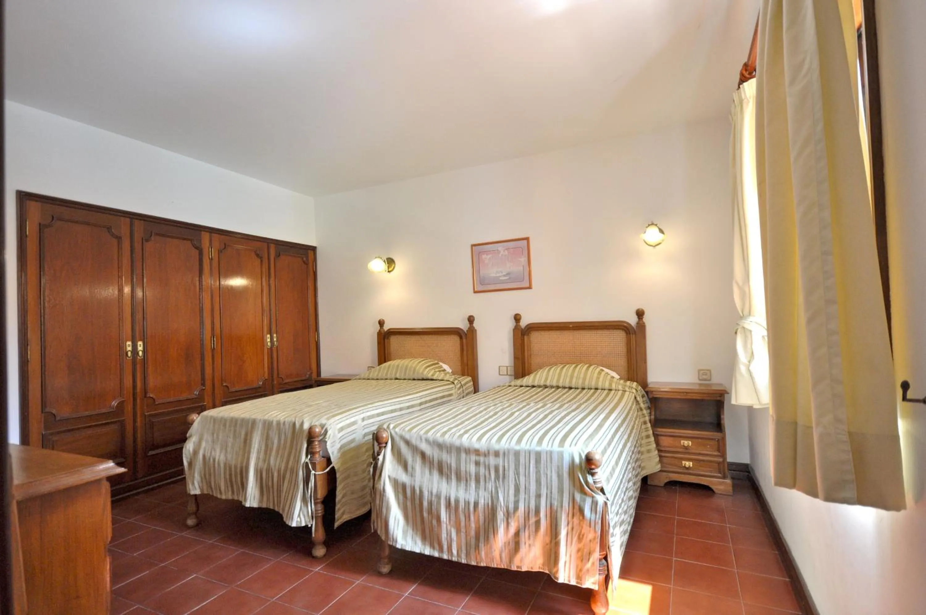 Bed in Set in good sized, mature gardens which afford a very good degree of privacy and