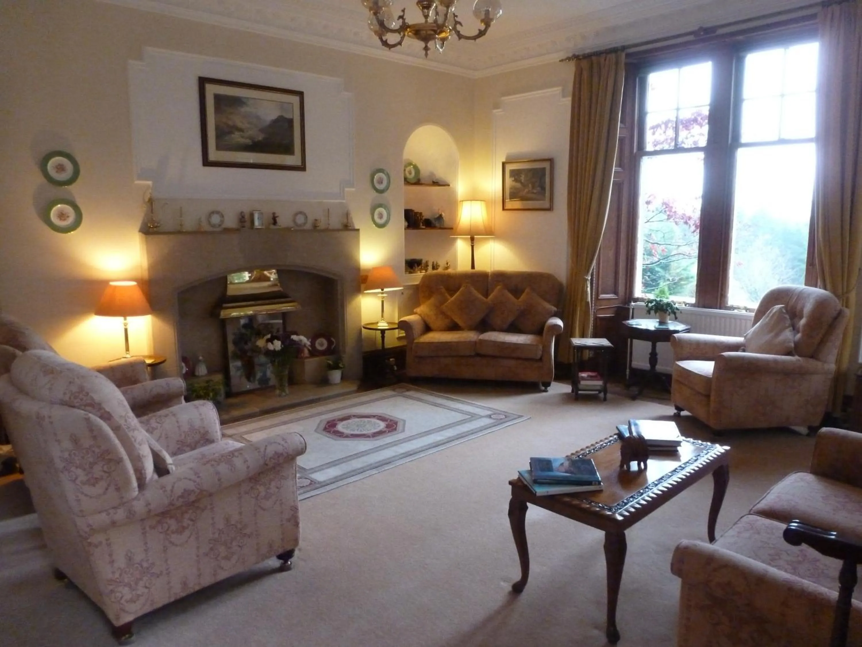 Communal lounge/ TV room in Tigh na Sgiath Country House Hotel