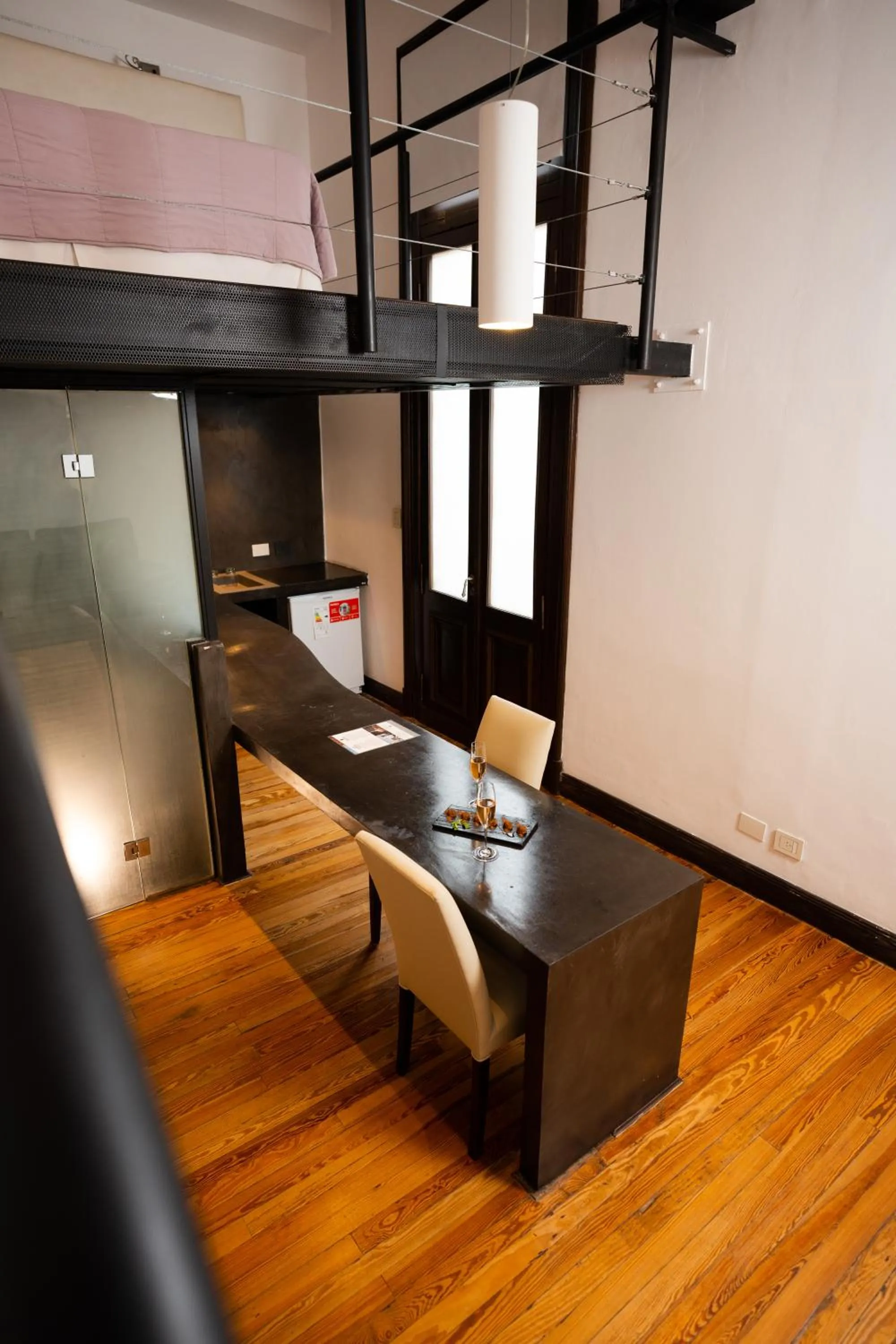 Kitchen or kitchenette in Loft Osteria by Sagardi