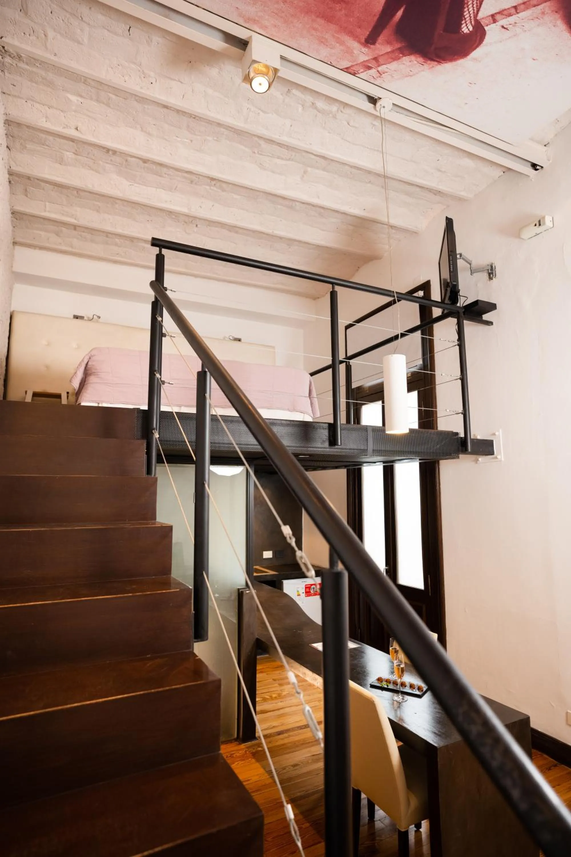 Bed in Loft Osteria by Sagardi