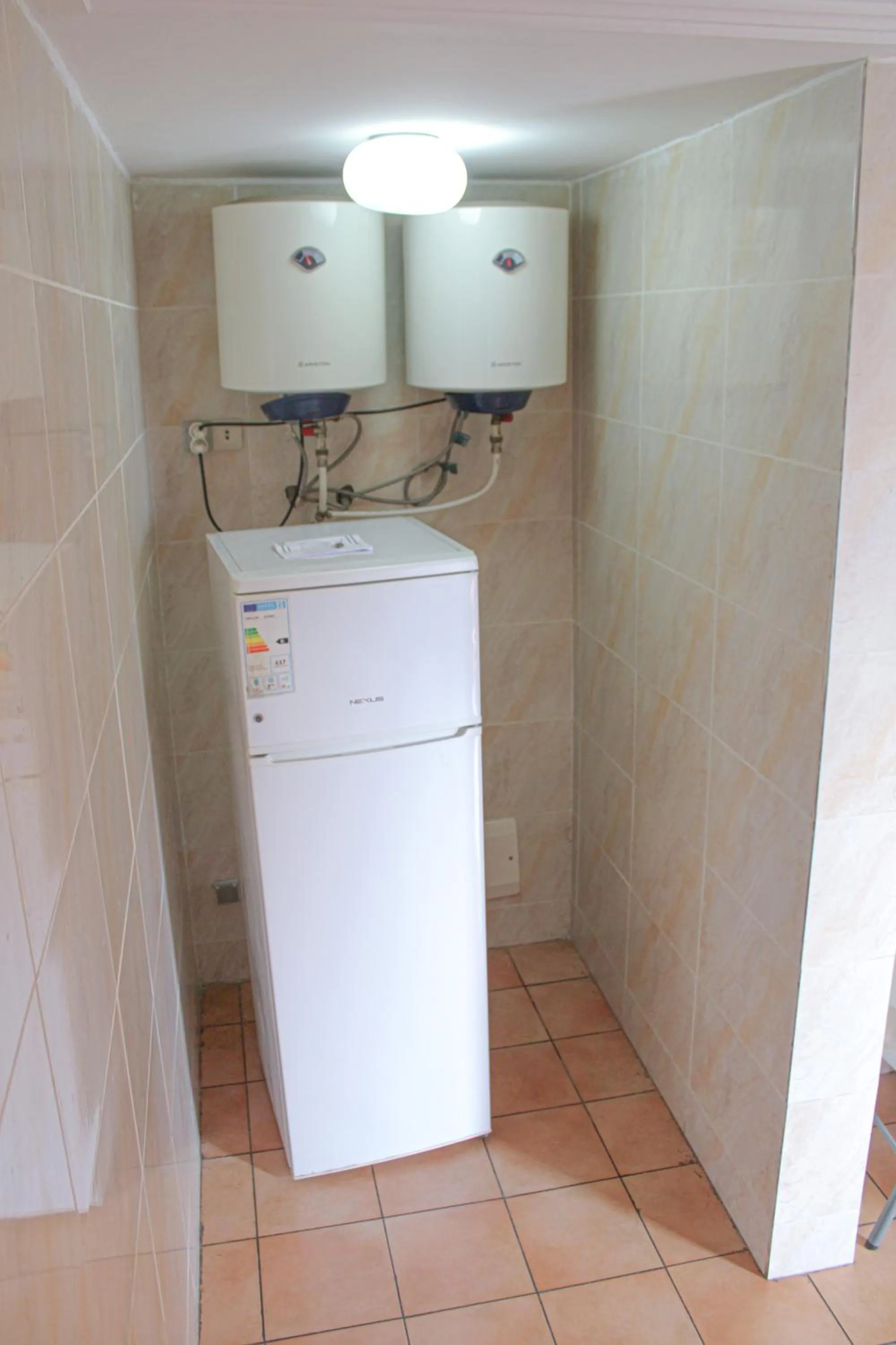 Kitchen or kitchenette in Residence Le Carat Bonapriso