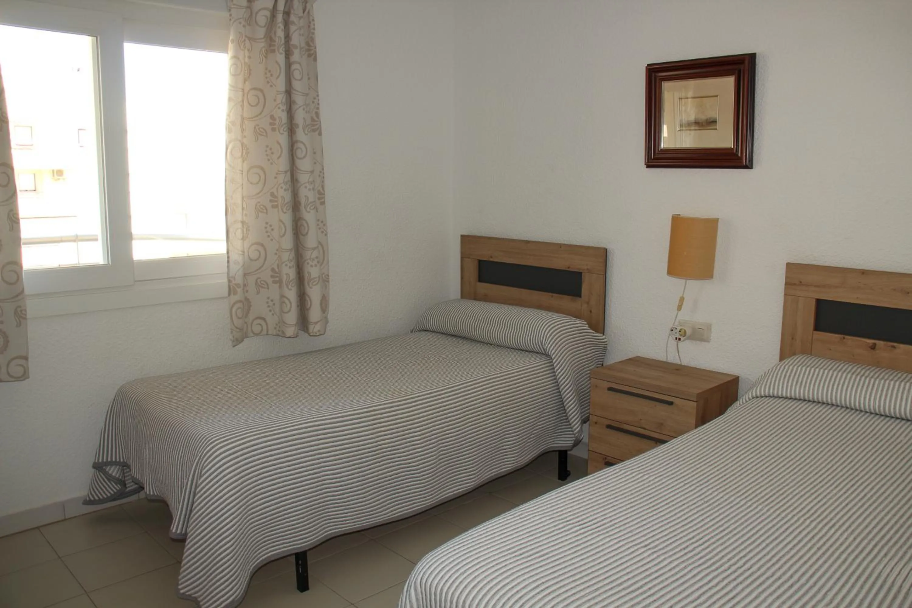 Bed in Apartamentos Turmalina Unitursa