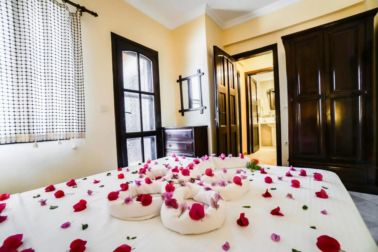 Bedroom in Mira Suites