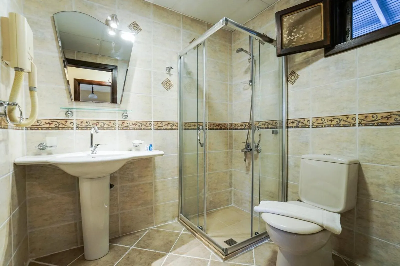 Bathroom in Mira Suites