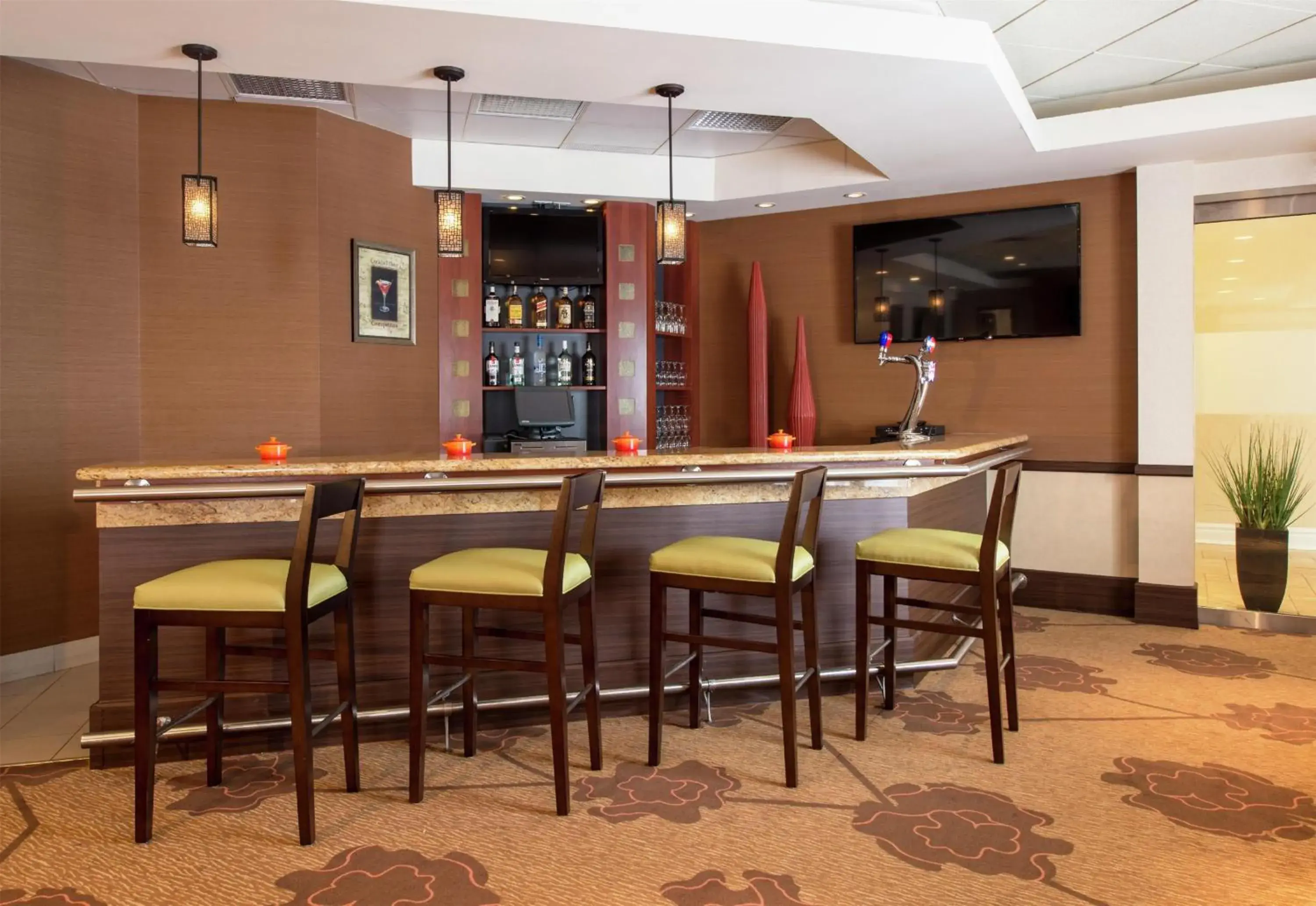 Lounge or bar in Hilton Garden Inn West Edmonton Lounge or bar in Hilton Garden Inn West Edmonton
