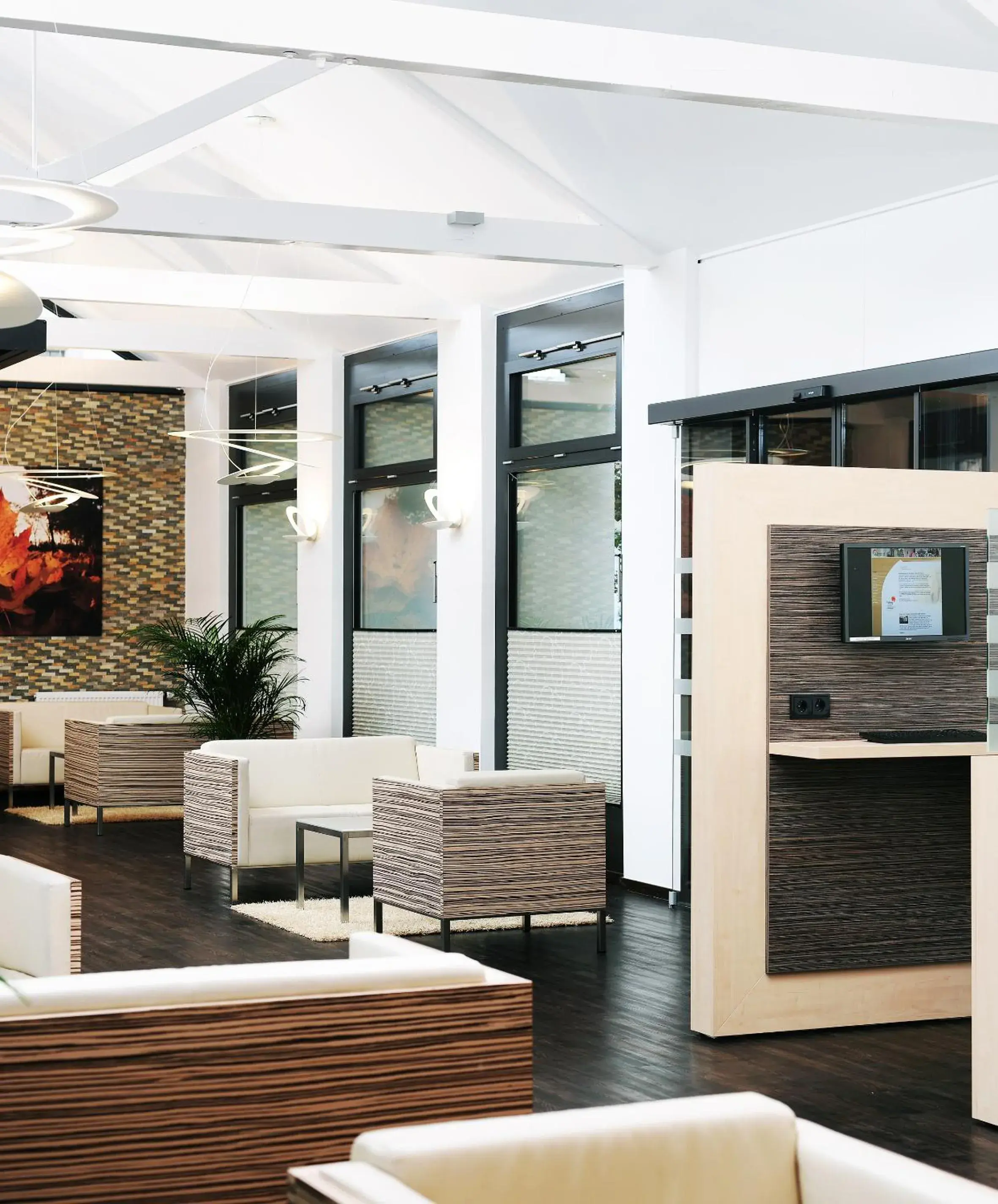 Lobby or reception in Bildungshaus St. Bernhard - Wohnen und Tagen Lobby or reception in Bildungshaus St. Bernhard - Wohnen und Tagen