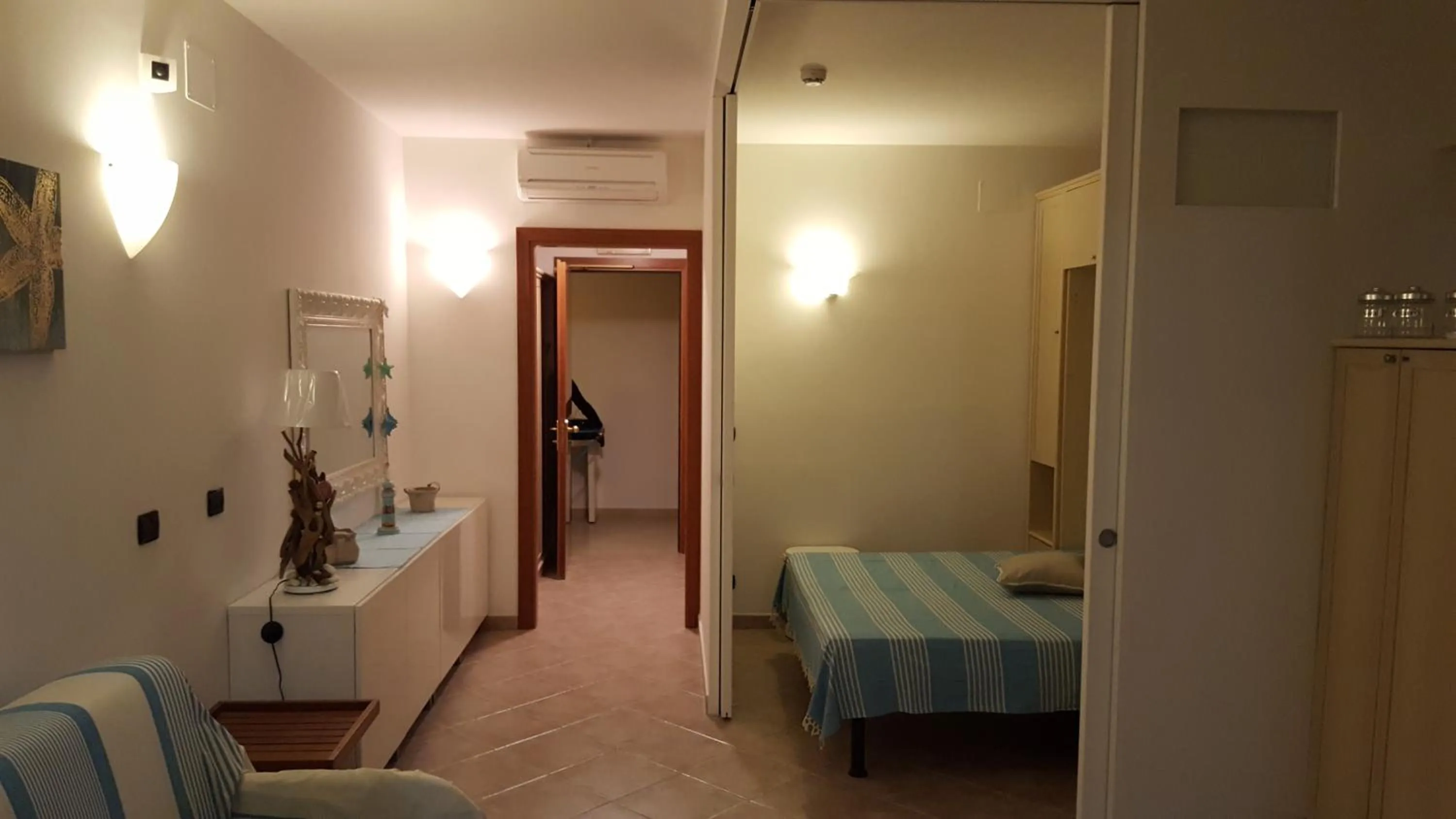 Living room, Bed in residenza " Verde Blu "