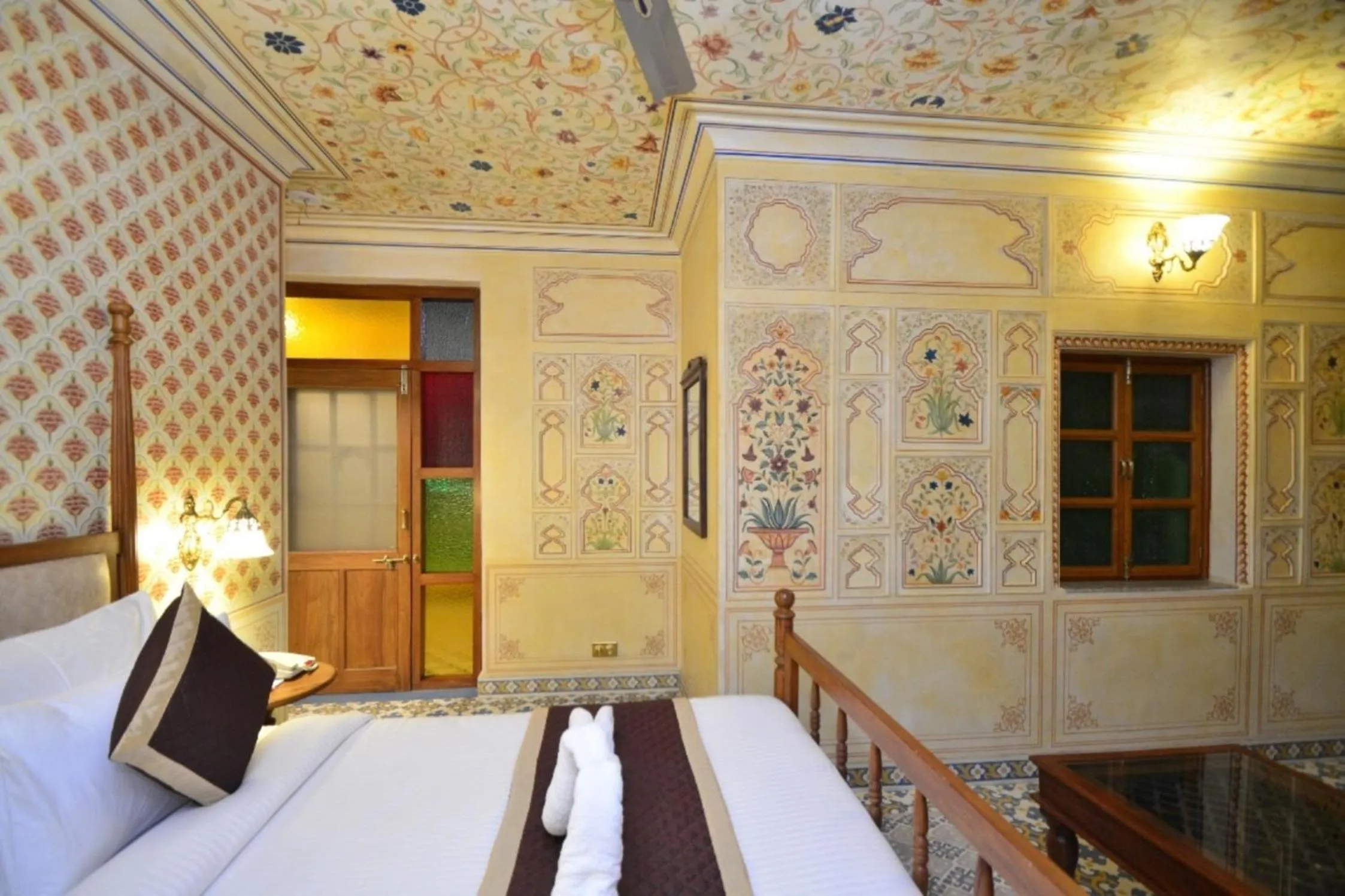Bed in Nirbana Palace - A Heritage Hotel and Spa