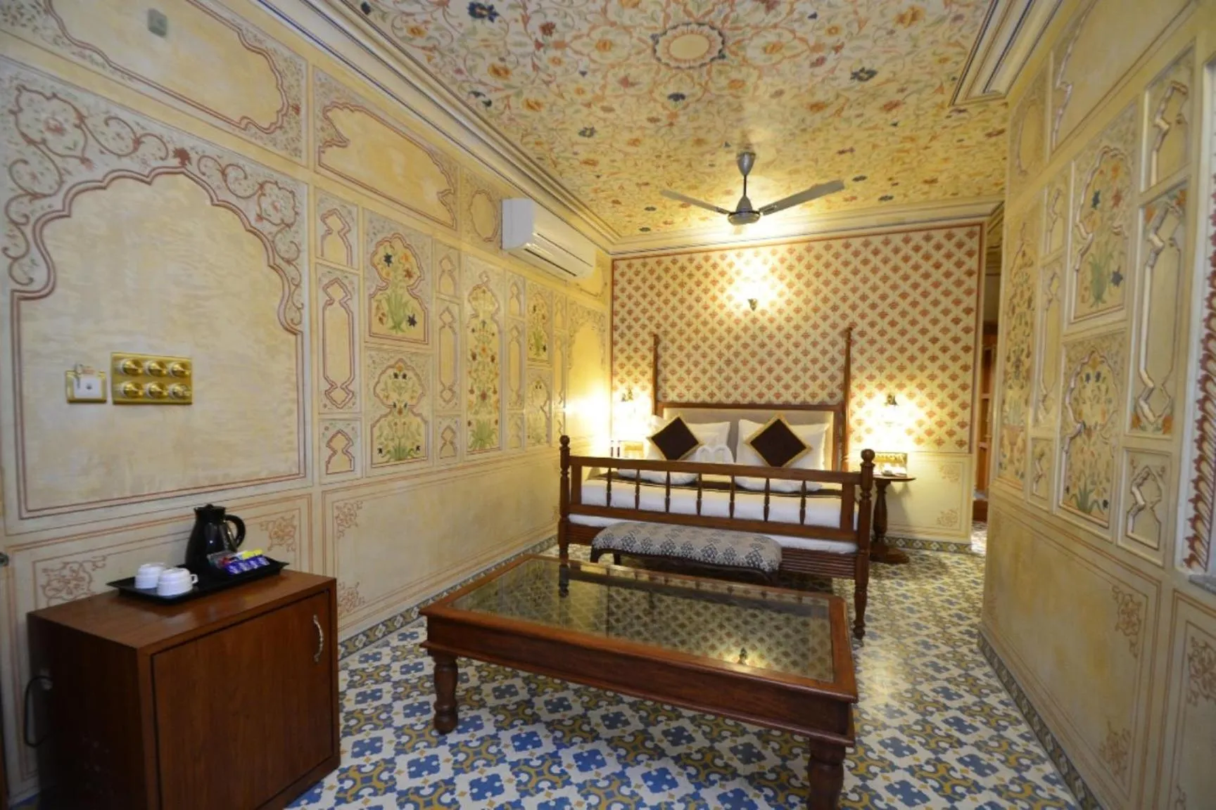 Bed in Nirbana Palace - A Heritage Hotel and Spa