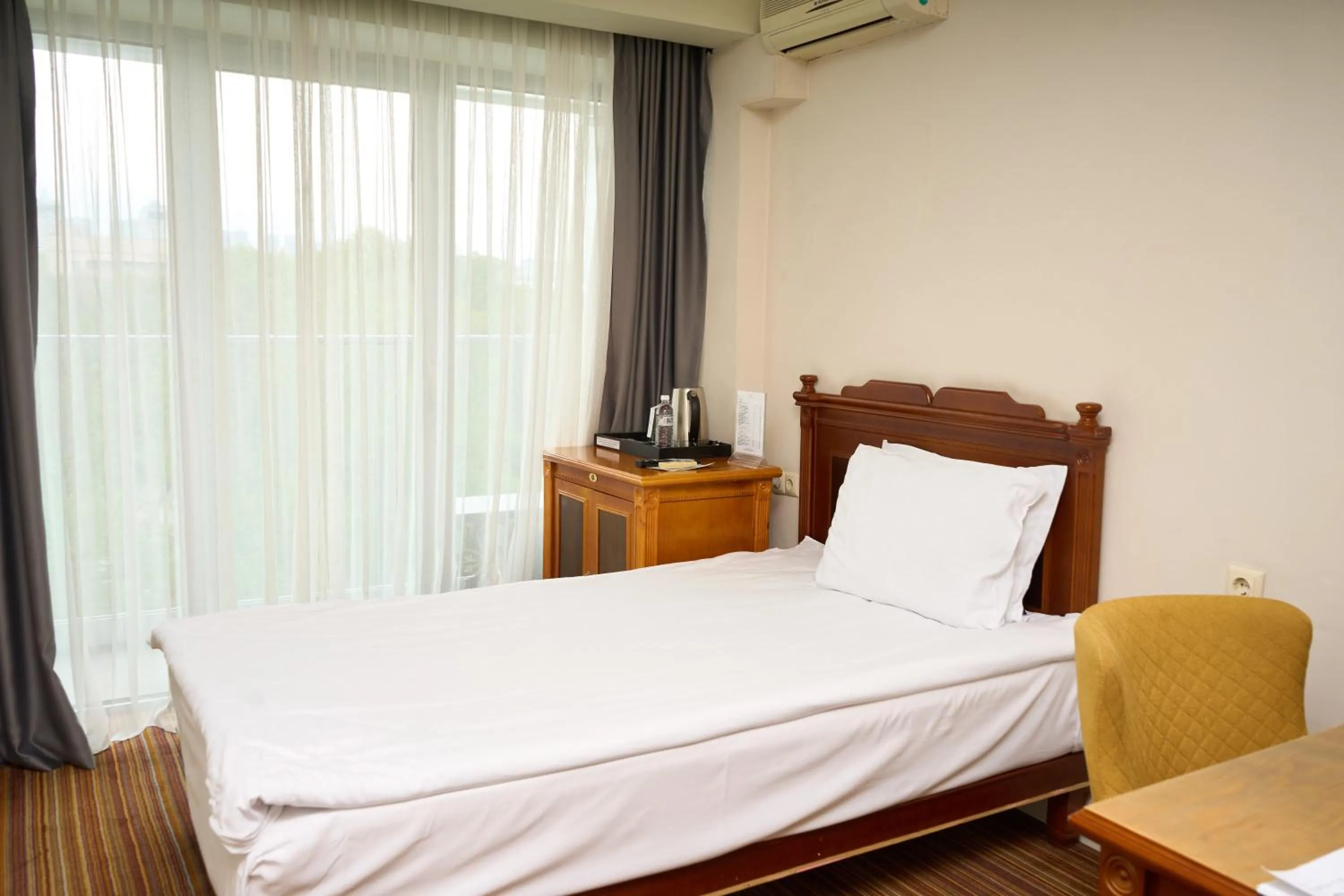 Photo of the whole room, Bed in Almaty Hotel