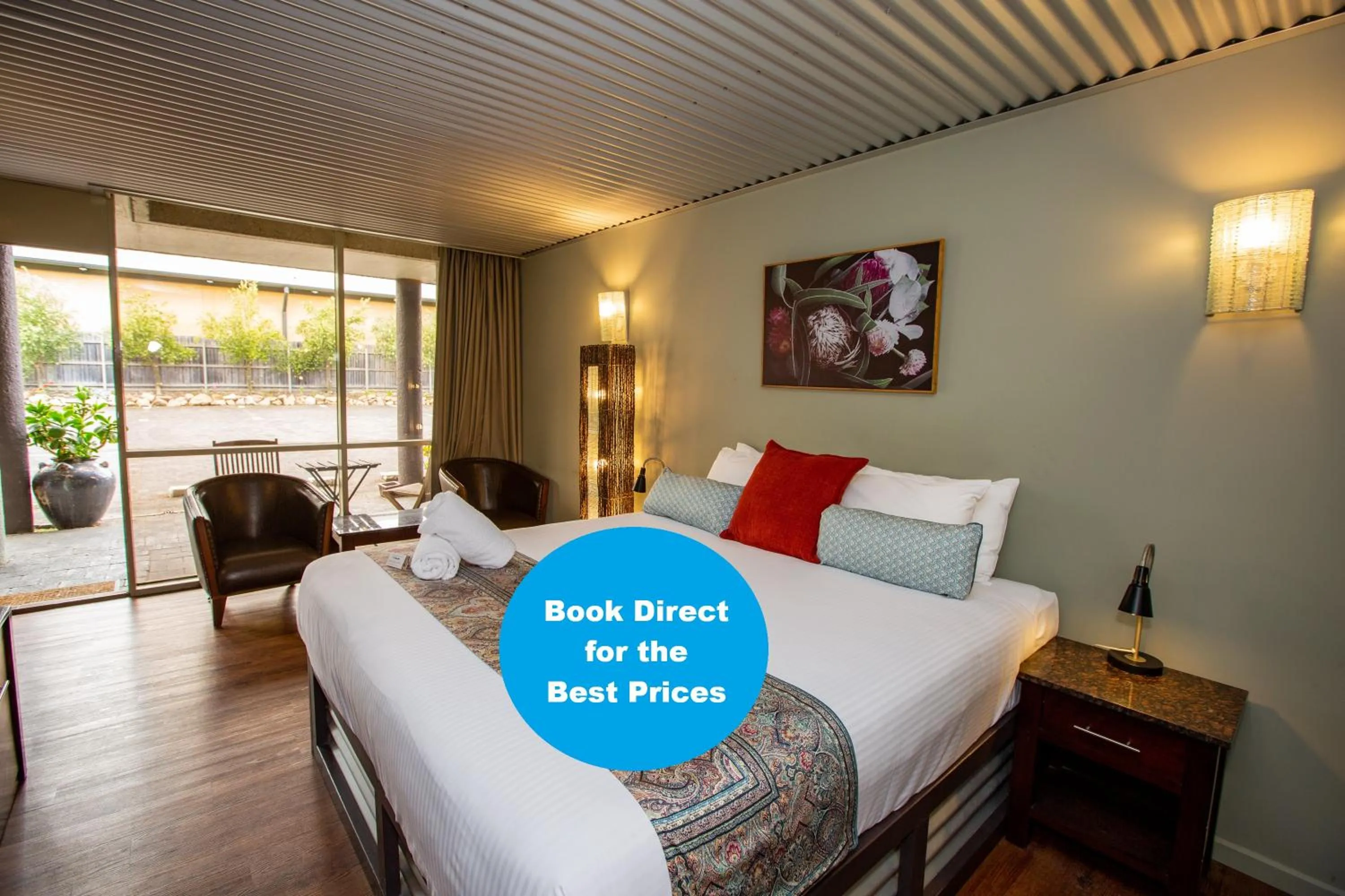 Bed in The Olive Tree Motel