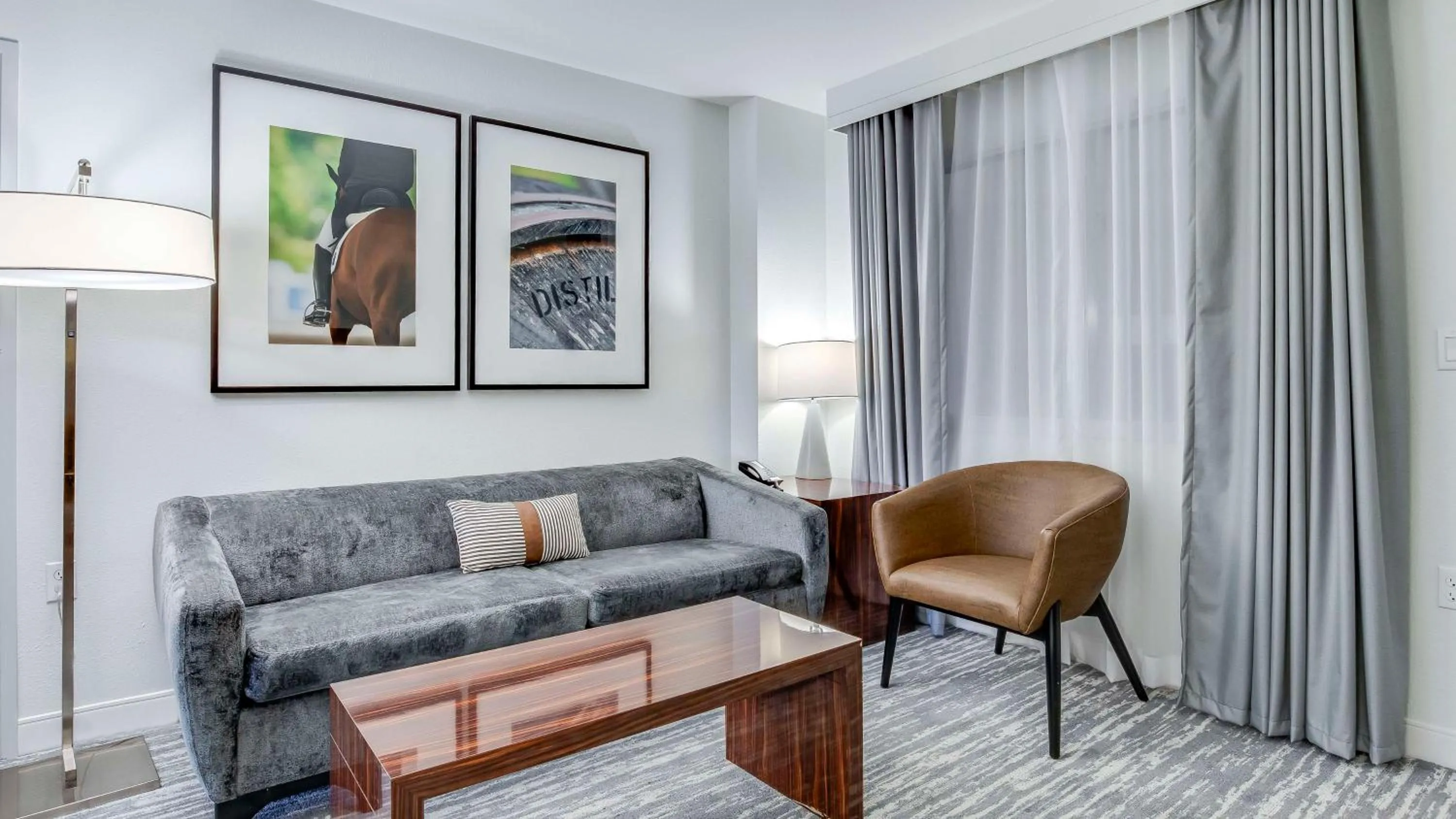 Living room in Embassy Suites by Hilton Louisville East