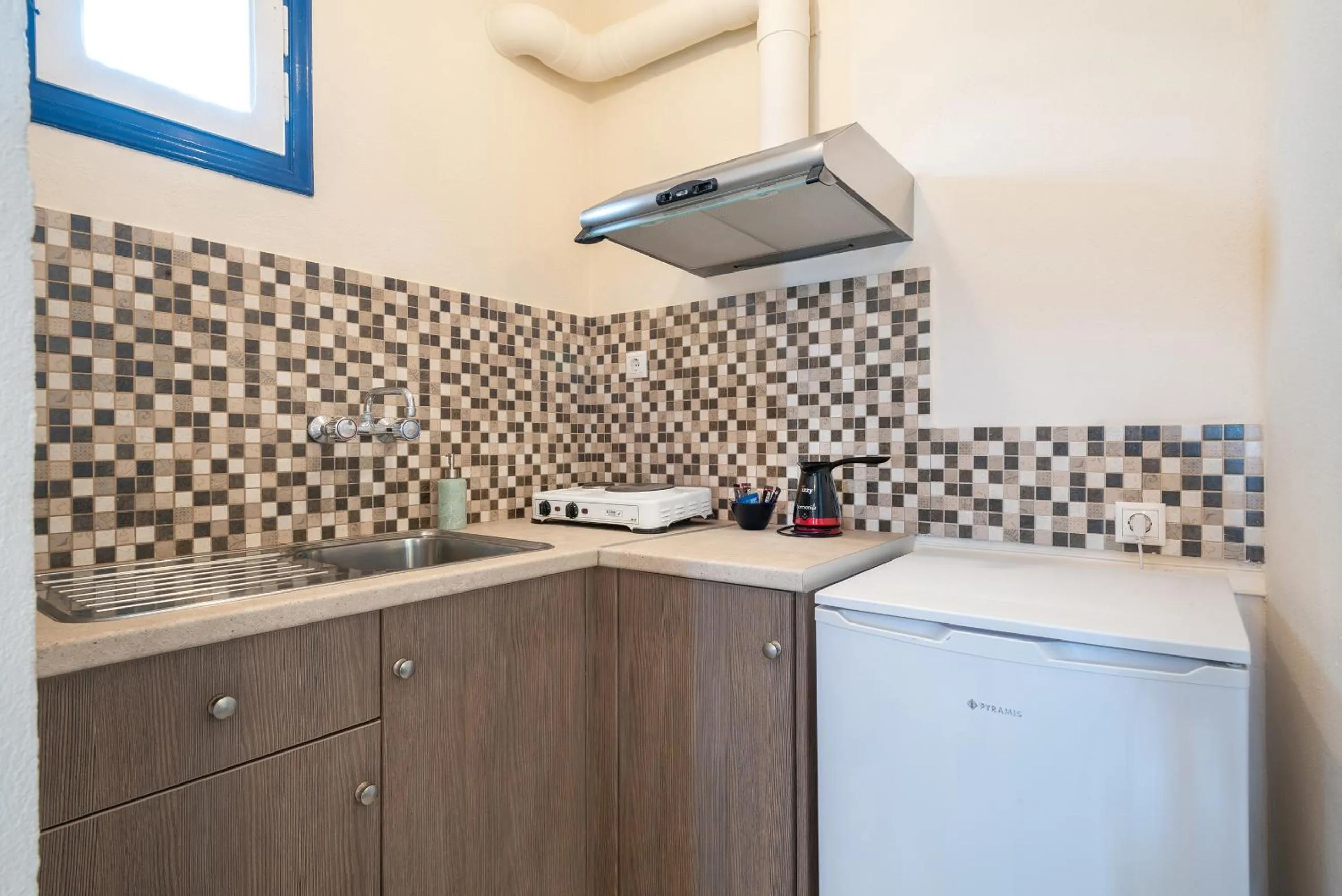 Kitchen or kitchenette in Sunset Hotel