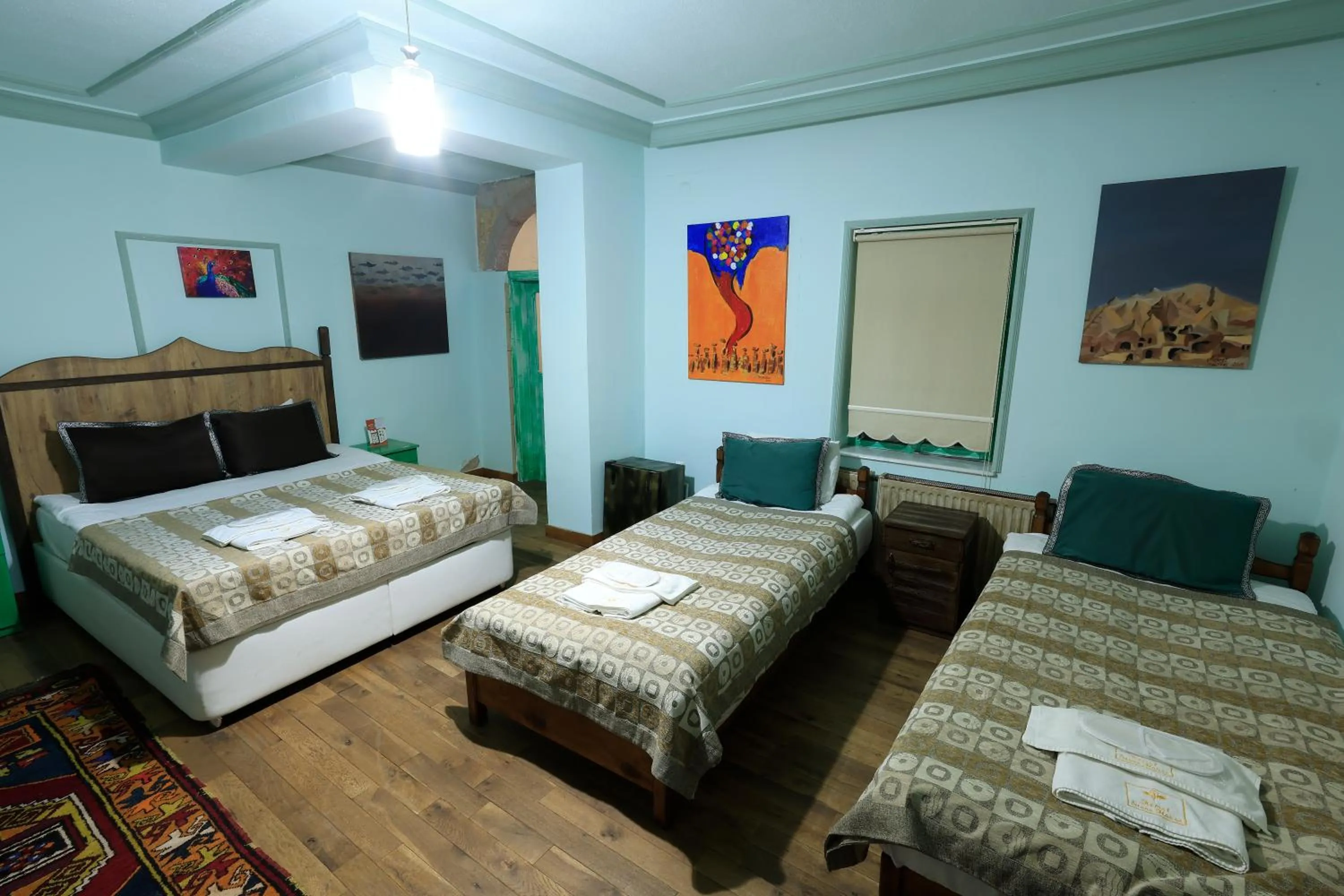 Bed in KEMAL STONE HOUSE HOTEL.