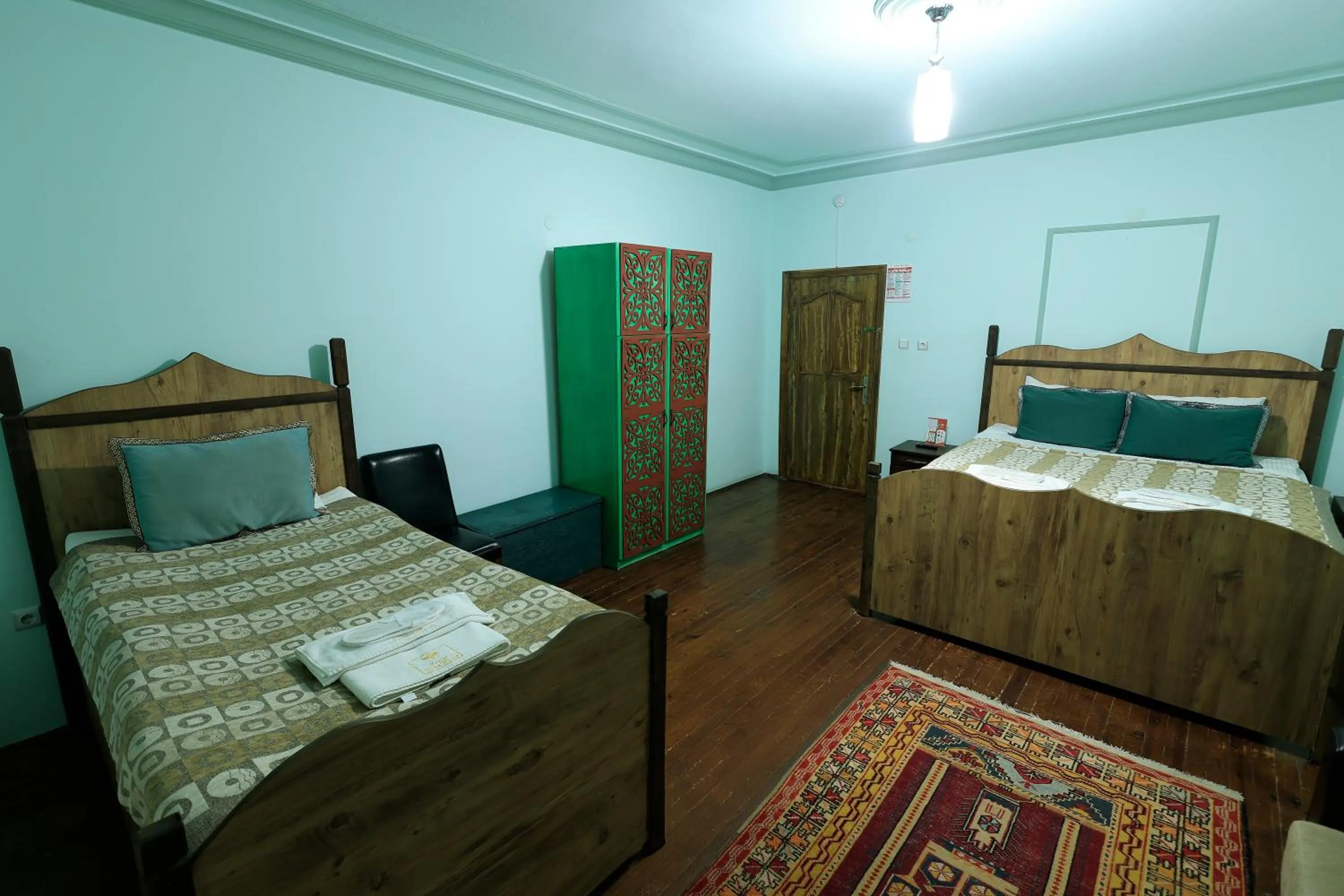 Photo of the whole room, Bed in KEMAL STONE HOUSE HOTEL.