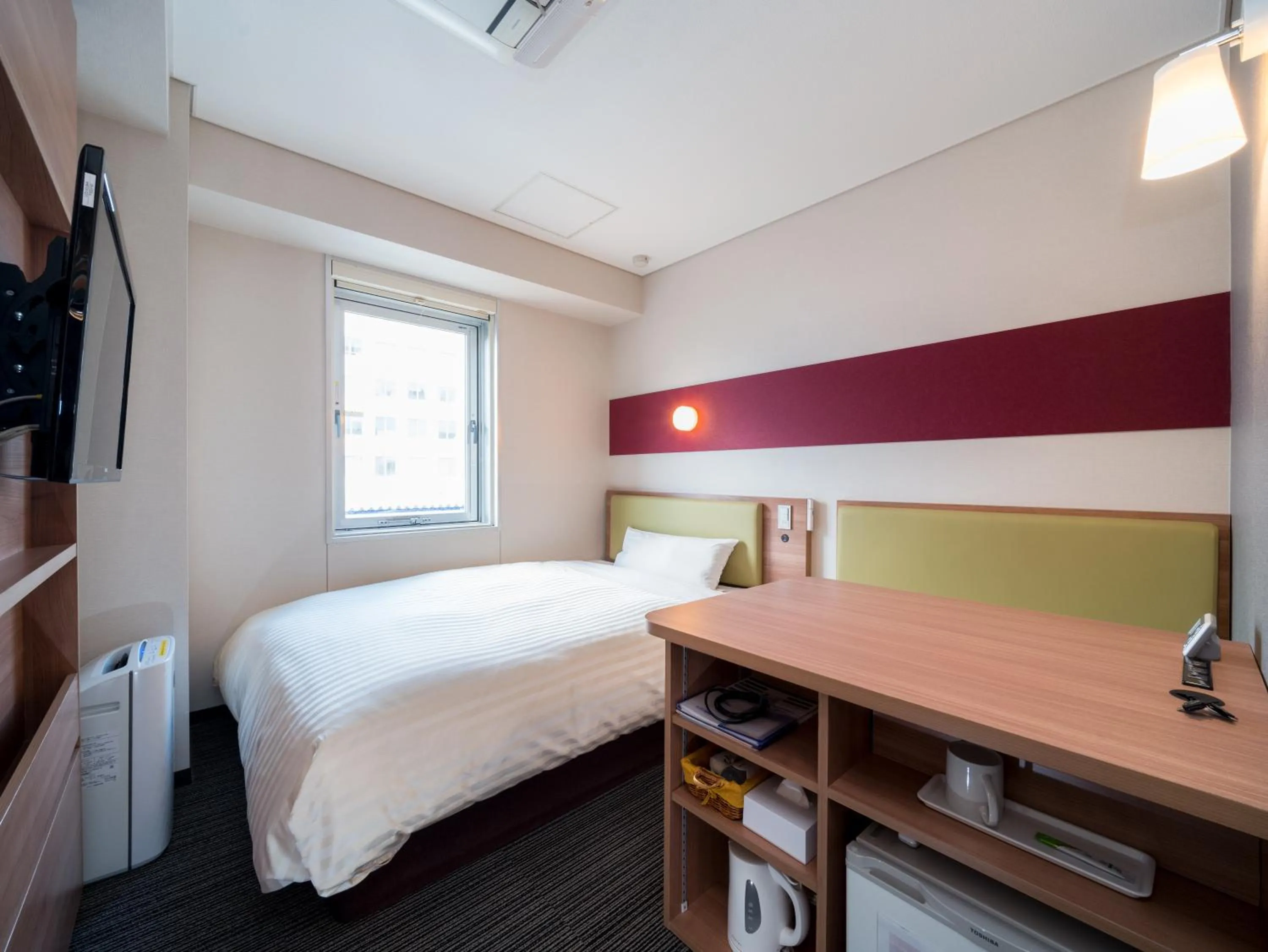 Bed in Super Hotel Aomori