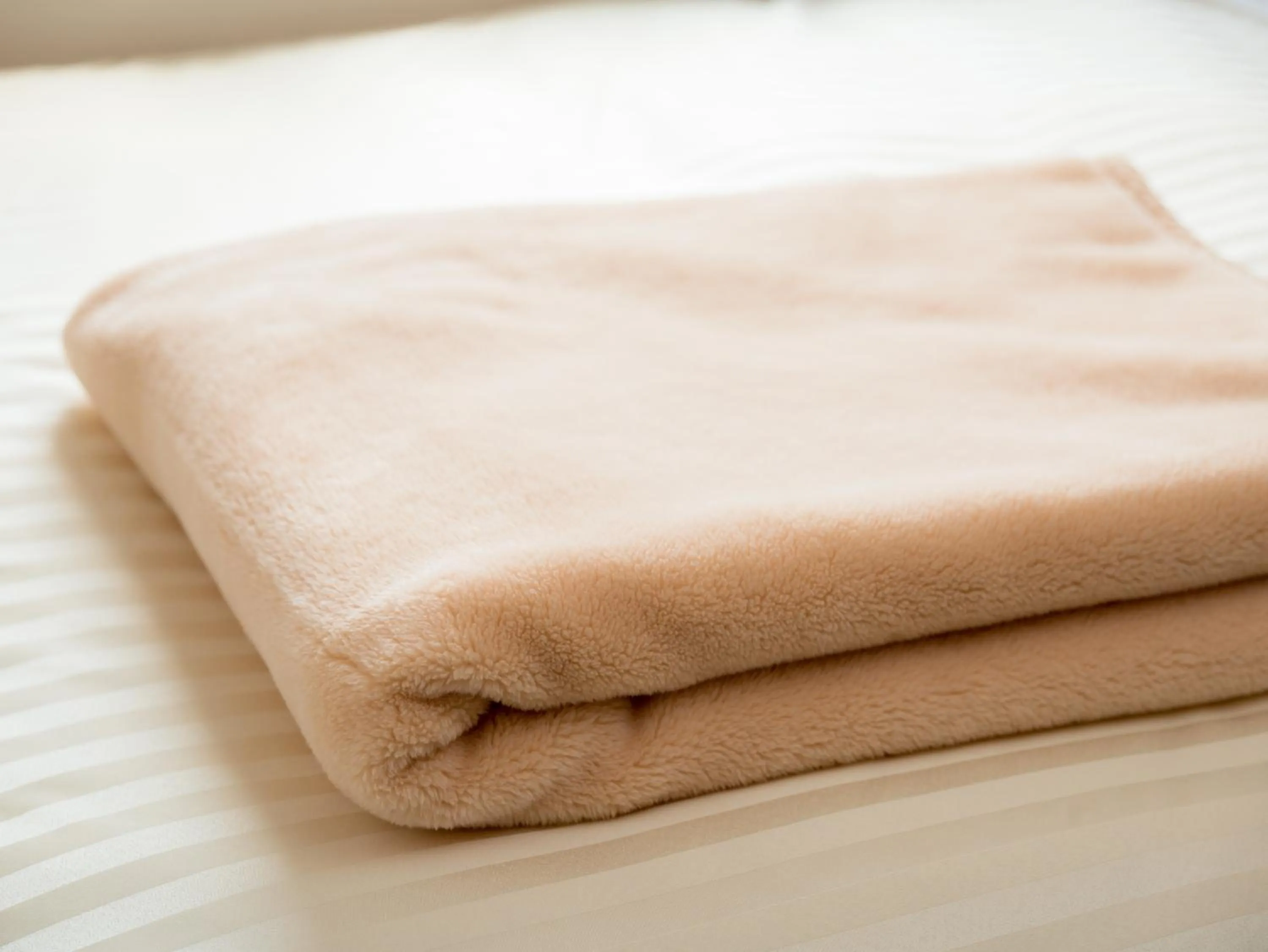 Bed in Super Hotel Aomori