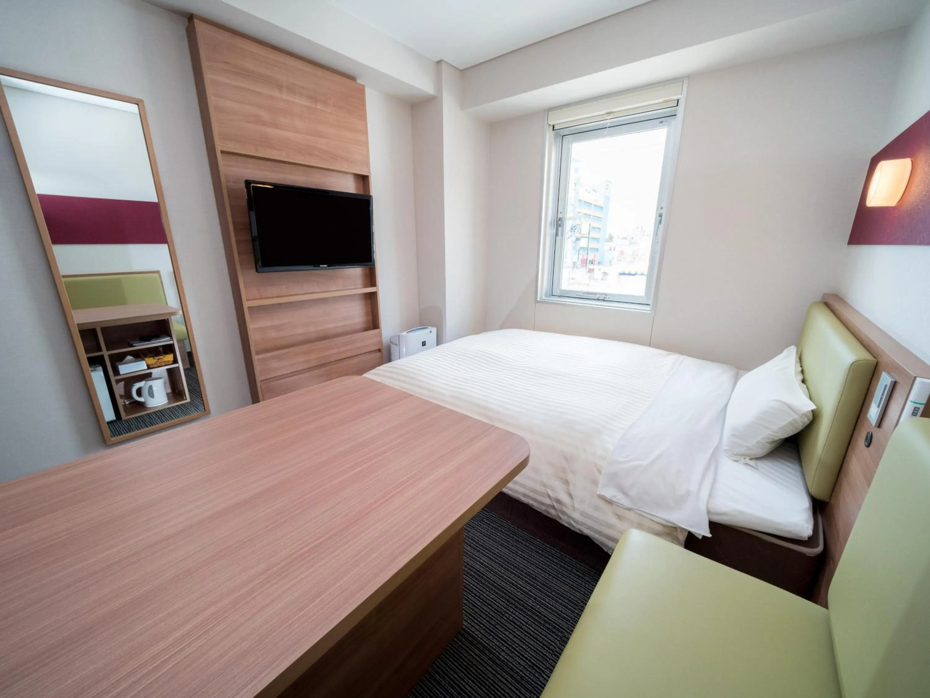 Bed in Super Hotel Aomori