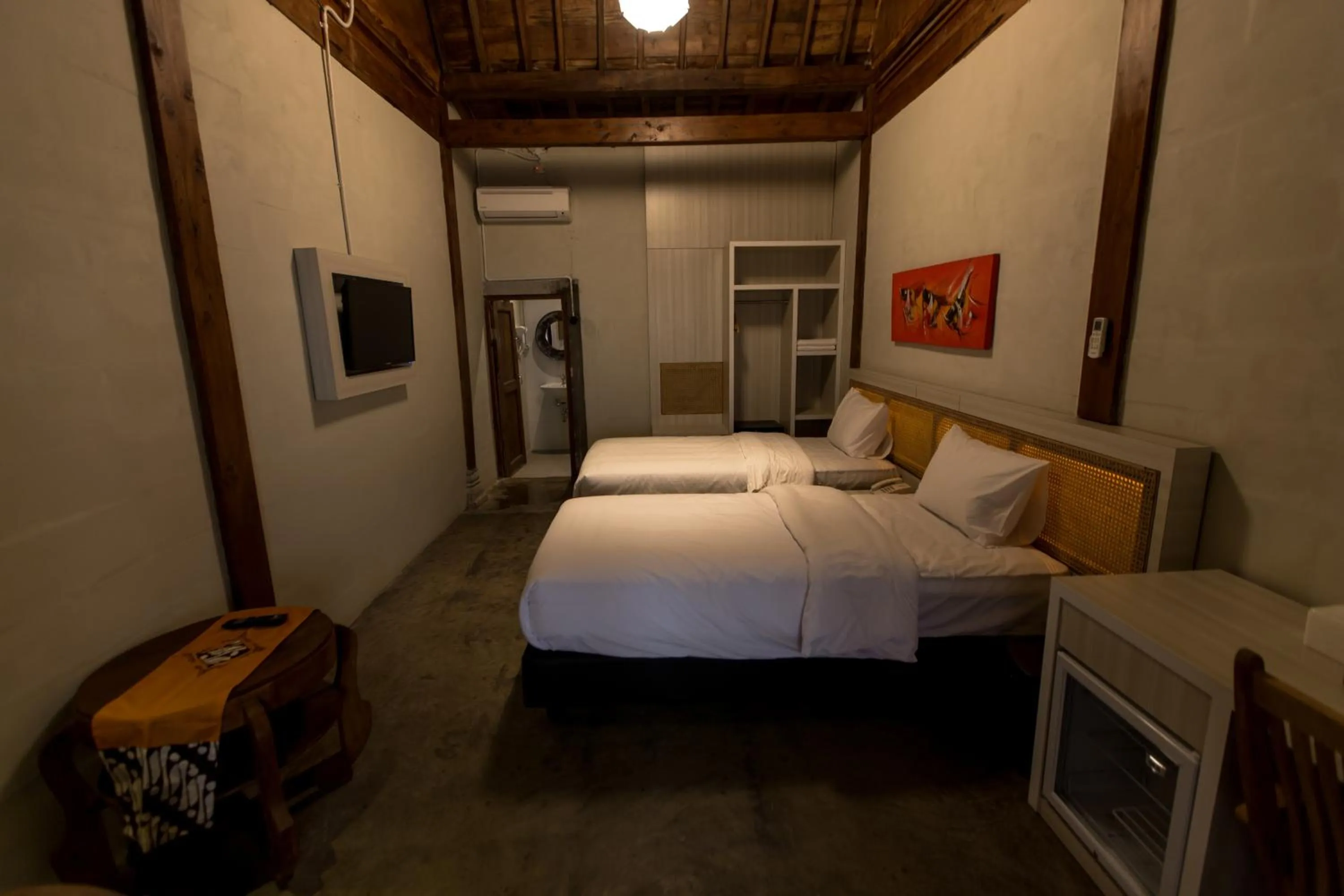 Photo of the whole room, Bed in Kampung Lawasan Heritage Cottage