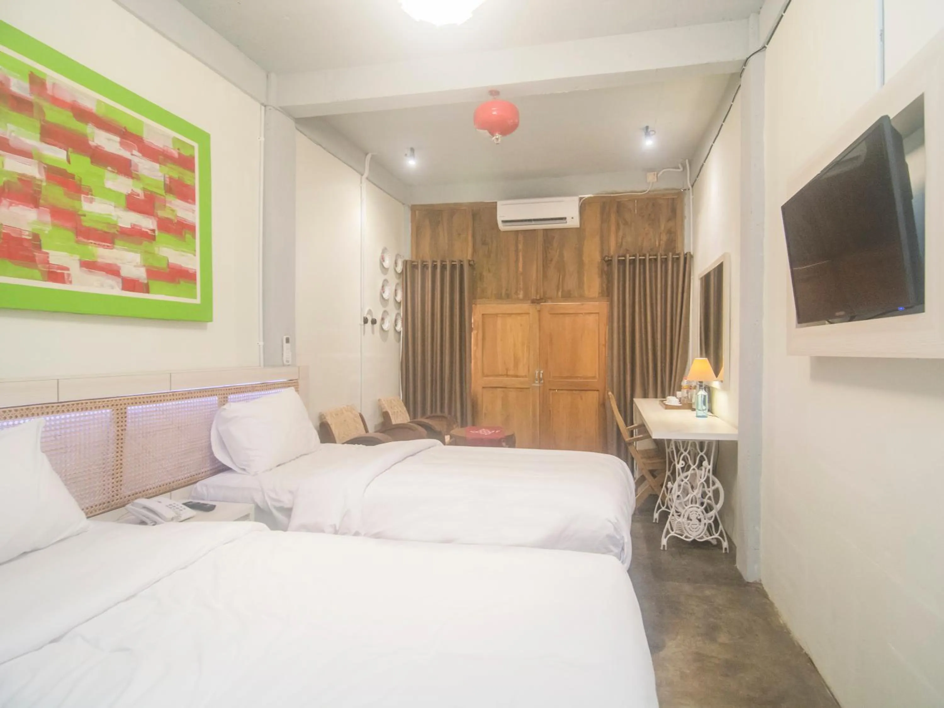 Photo of the whole room, Bed in Kampung Lawasan Heritage Cottage