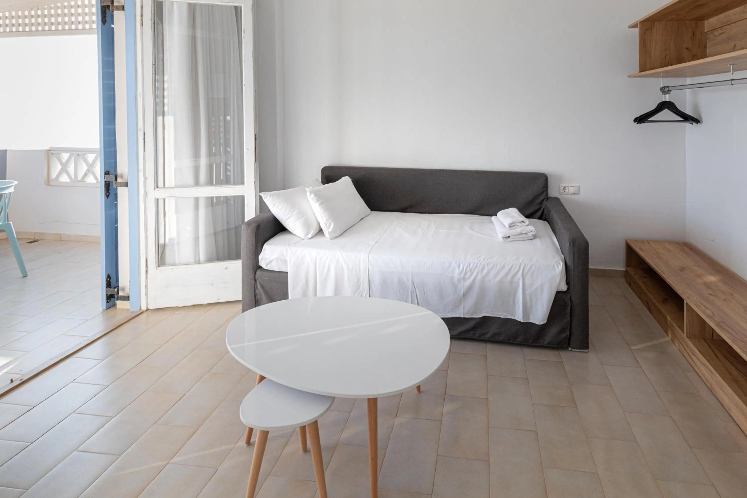 Bed in Triton Authentic Cretan Hotel