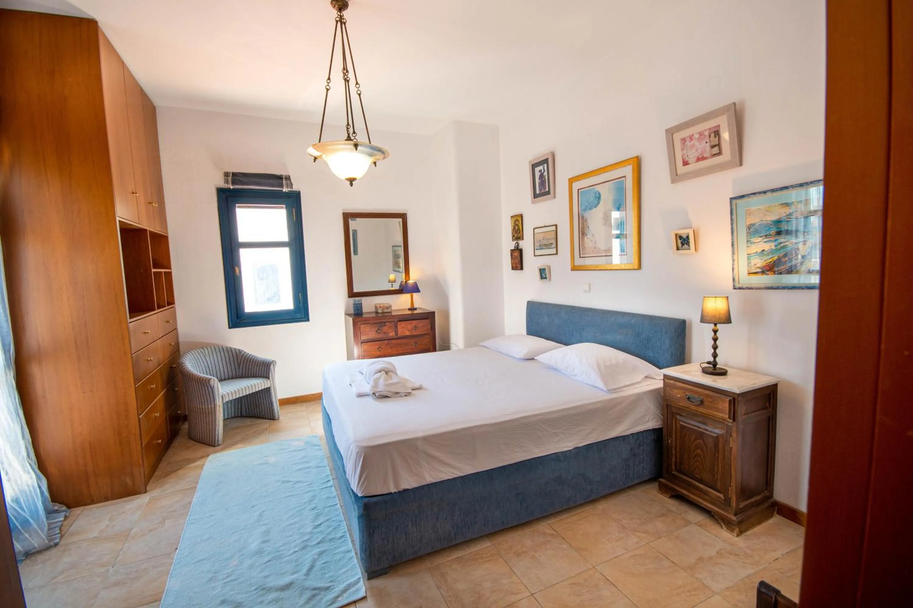 Bed in Triton Authentic Cretan Hotel