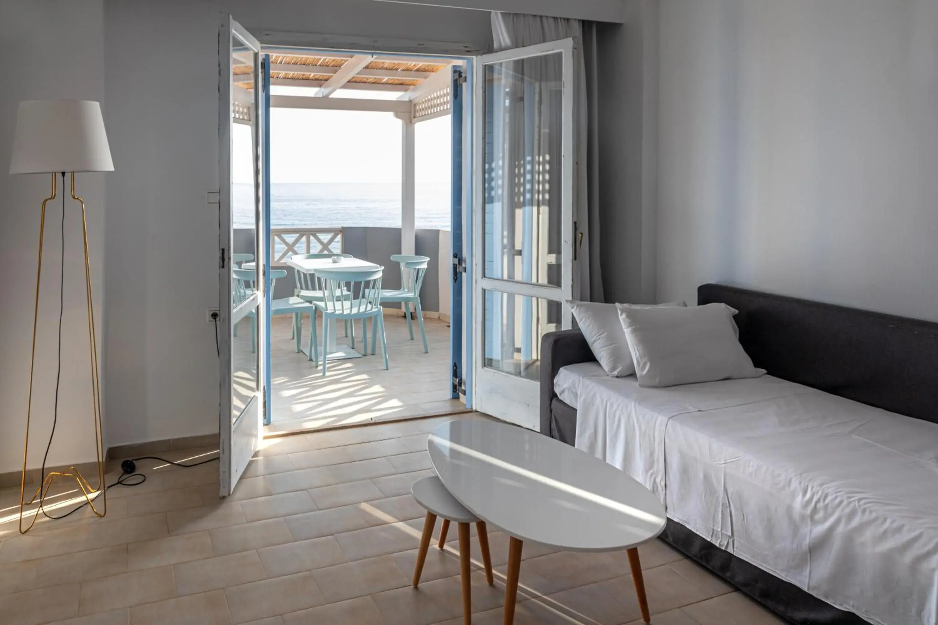 Living room, Bed in Triton Authentic Cretan Hotel Living room, Bed in Triton Authentic Cretan Hotel