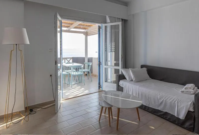 Living room, Bed in Triton Authentic Cretan Hotel