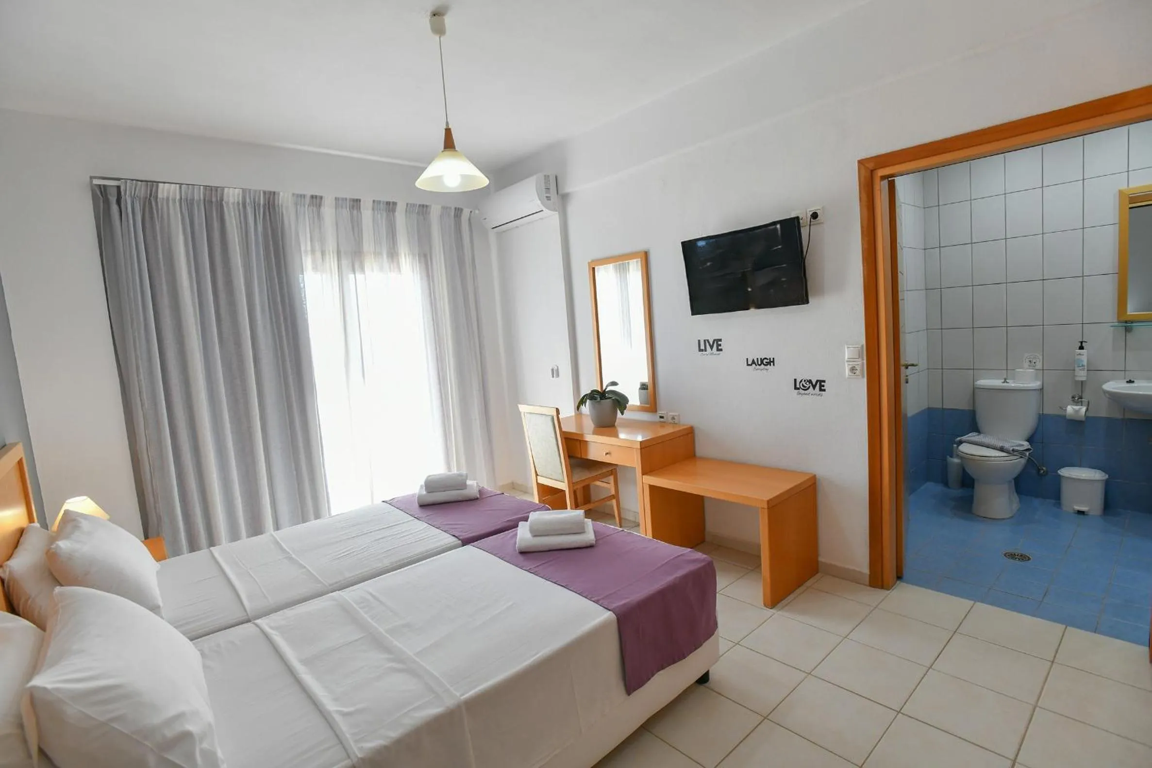 Bedroom, Bed in Triton Authentic Cretan Hotel