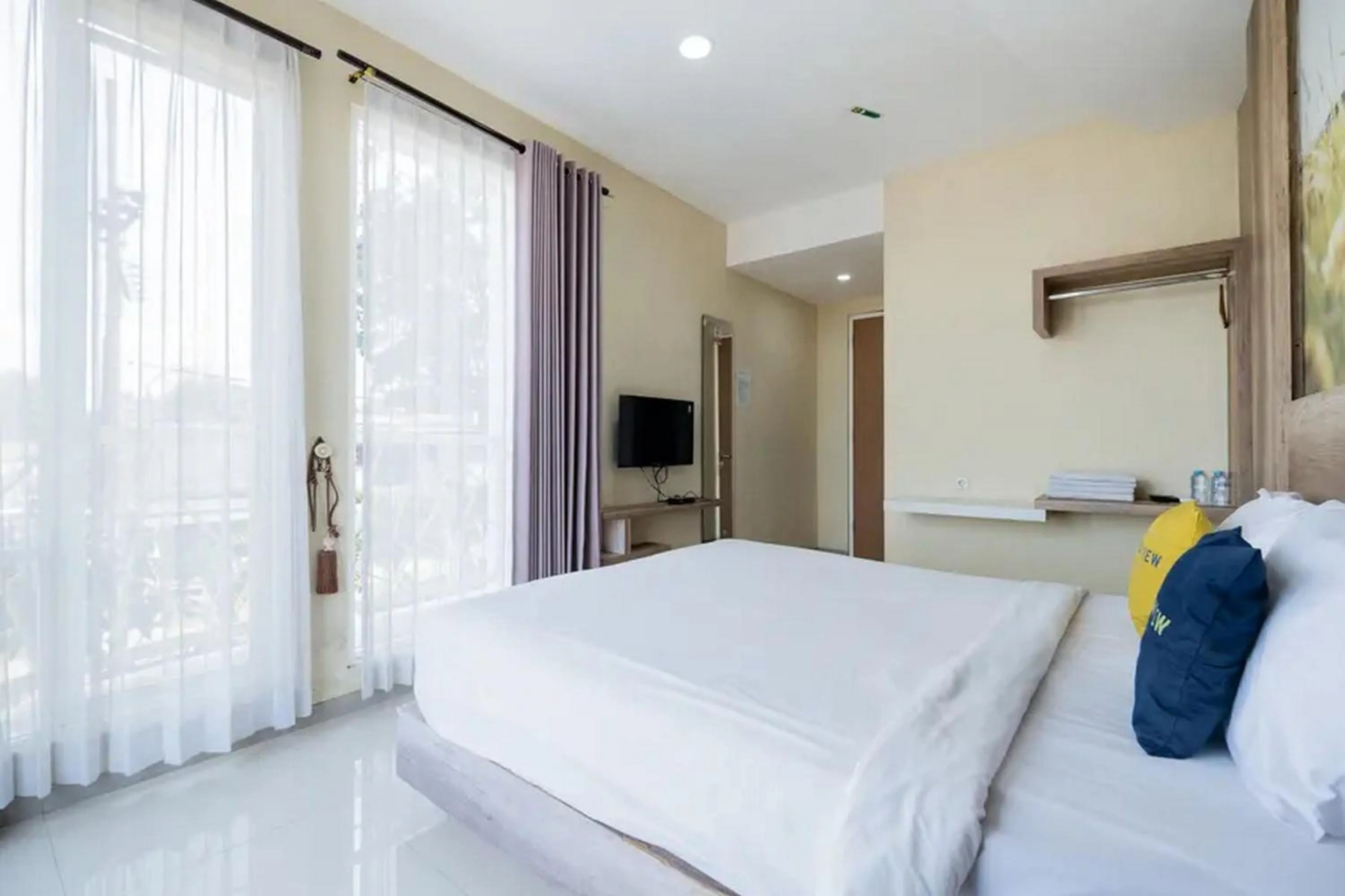 Bed in Urbanview Hotel Omah Anin Batu by RedDoorz