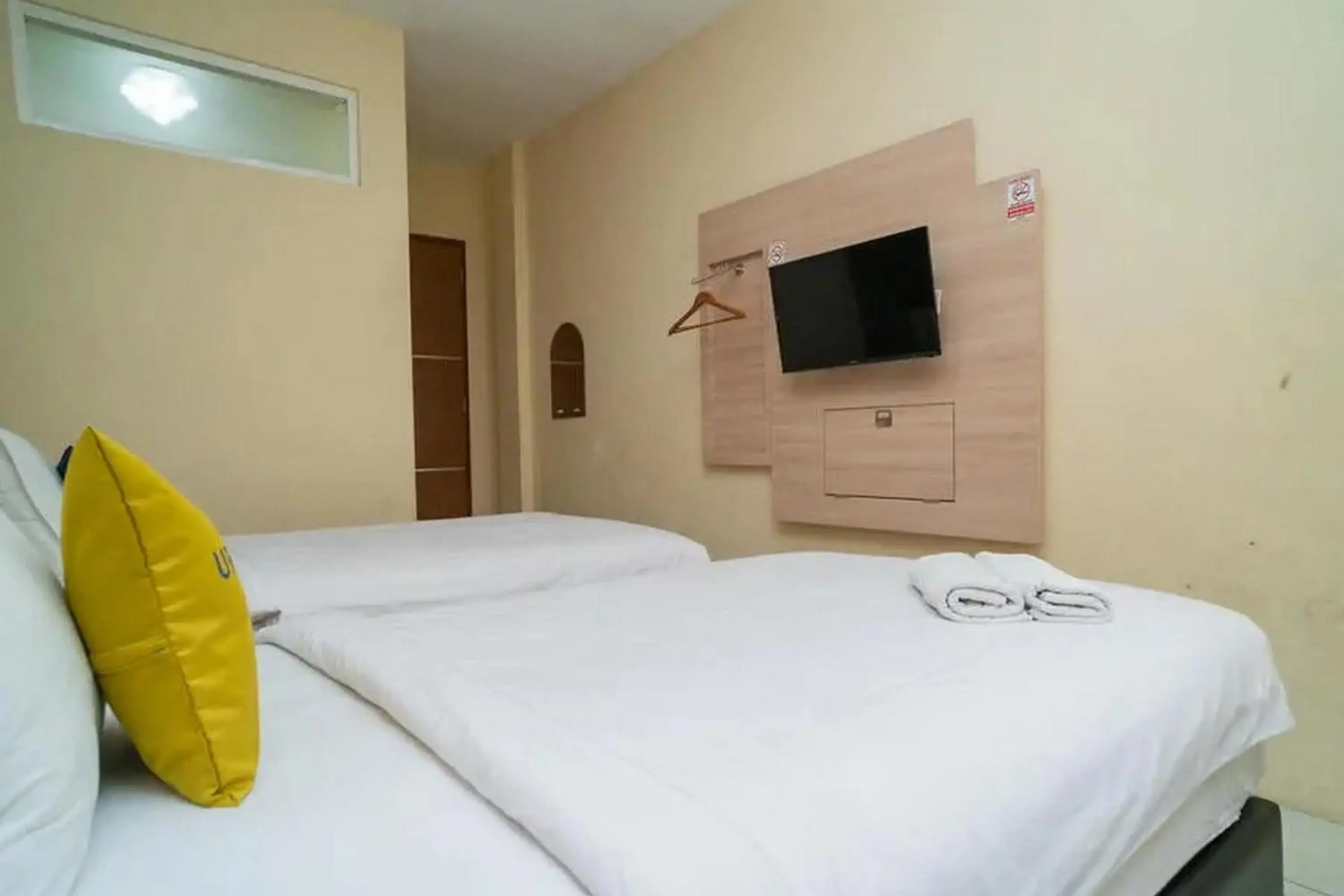 Bed in Urbanview Hotel Omah Anin Batu by RedDoorz Bed in Urbanview Hotel Omah Anin Batu by RedDoorz
