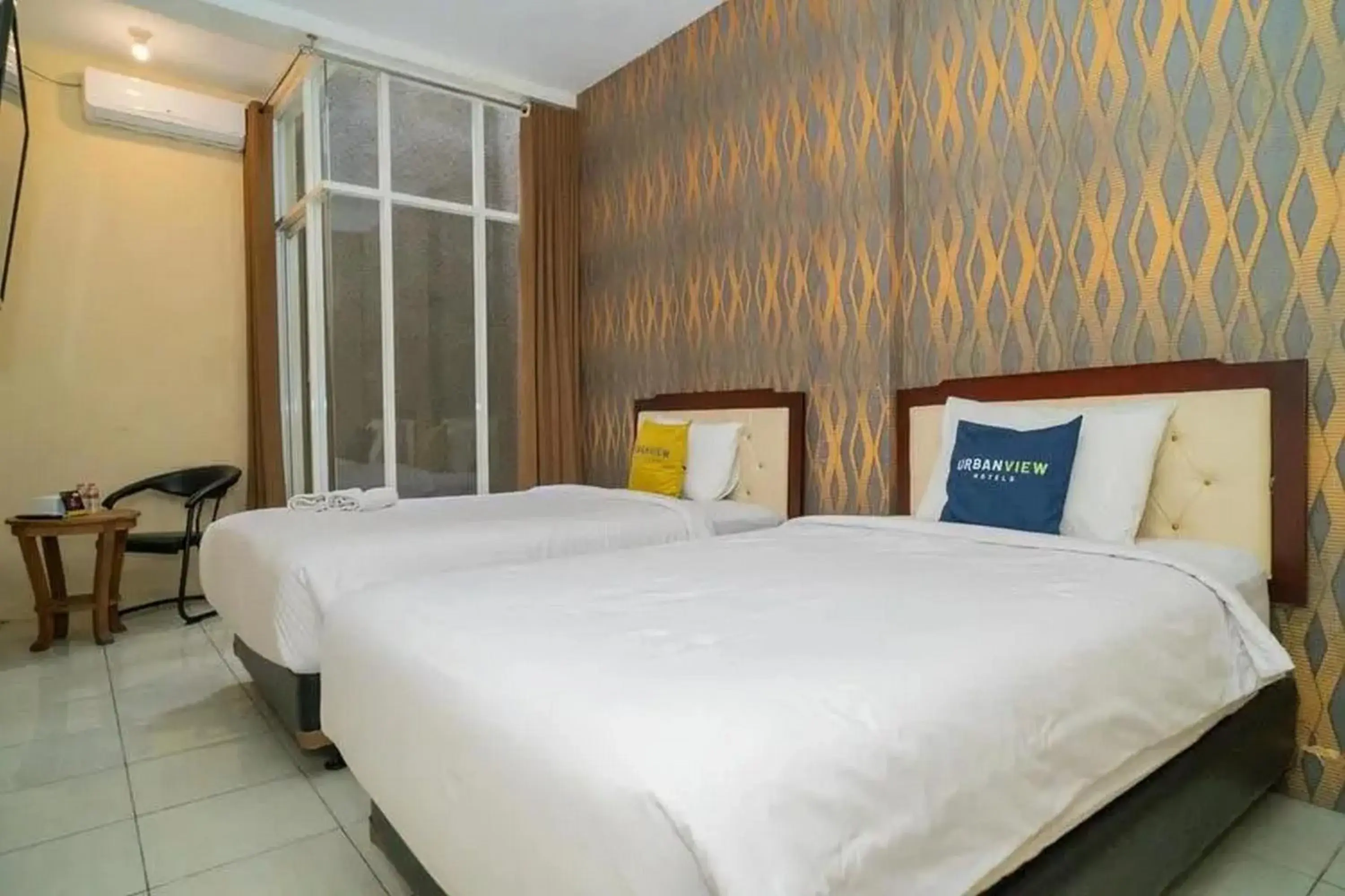 Twin Room in Urbanview Hotel Omah Anin Batu by RedDoorz Twin Room in Urbanview Hotel Omah Anin Batu by RedDoorz