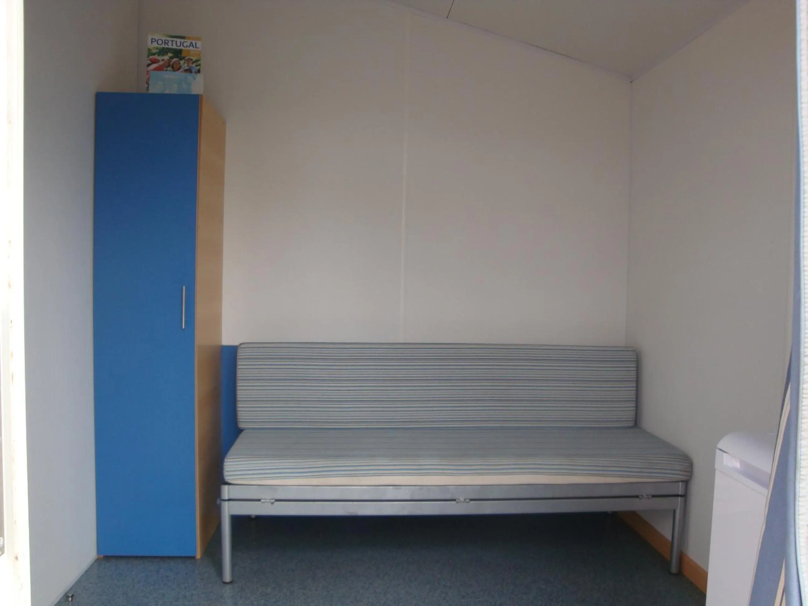 Living room, Bed in Parque de Campismo Orbitur Sitava Milfontes