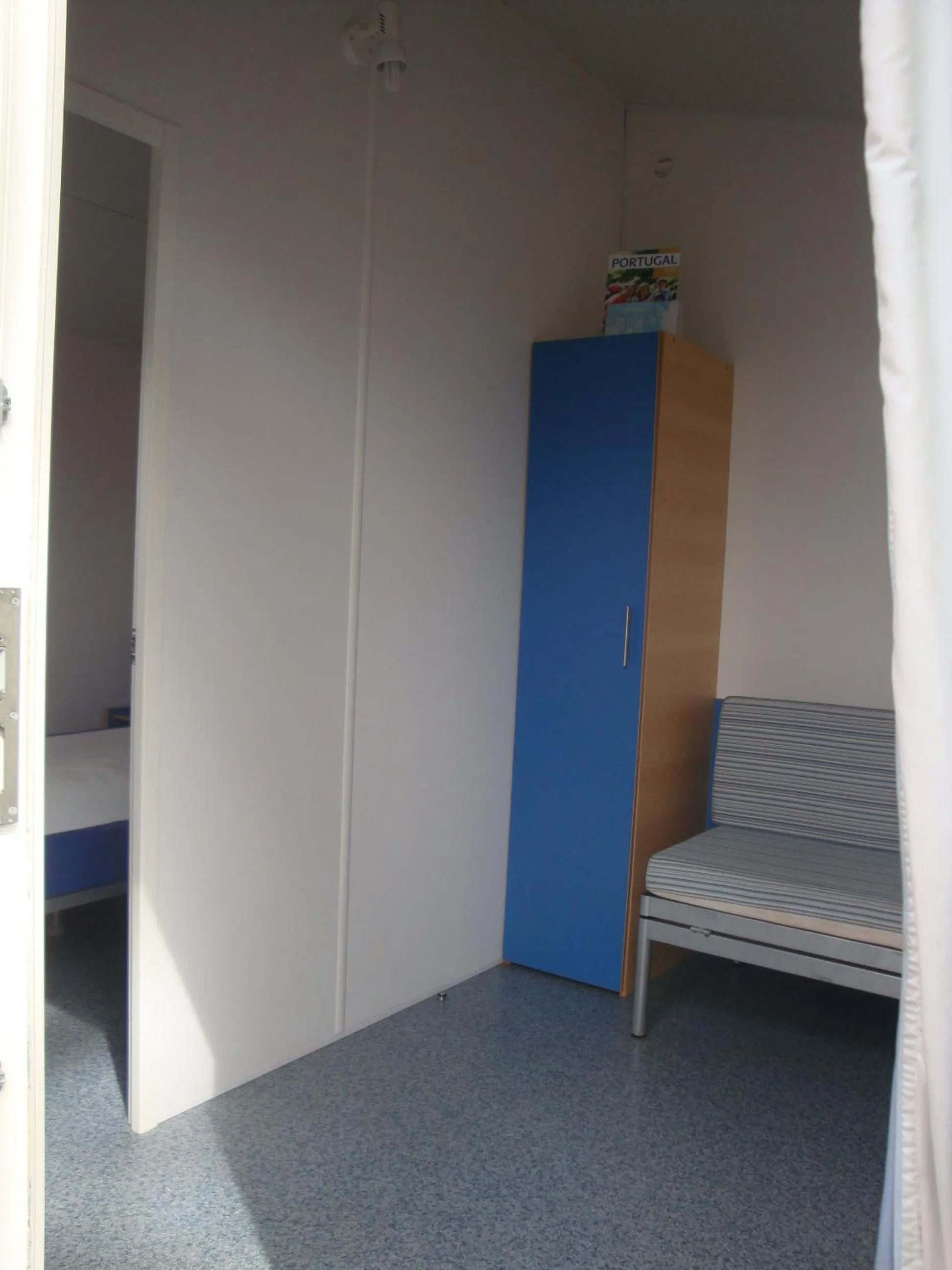 Living room, Bed in Parque de Campismo Orbitur Sitava Milfontes