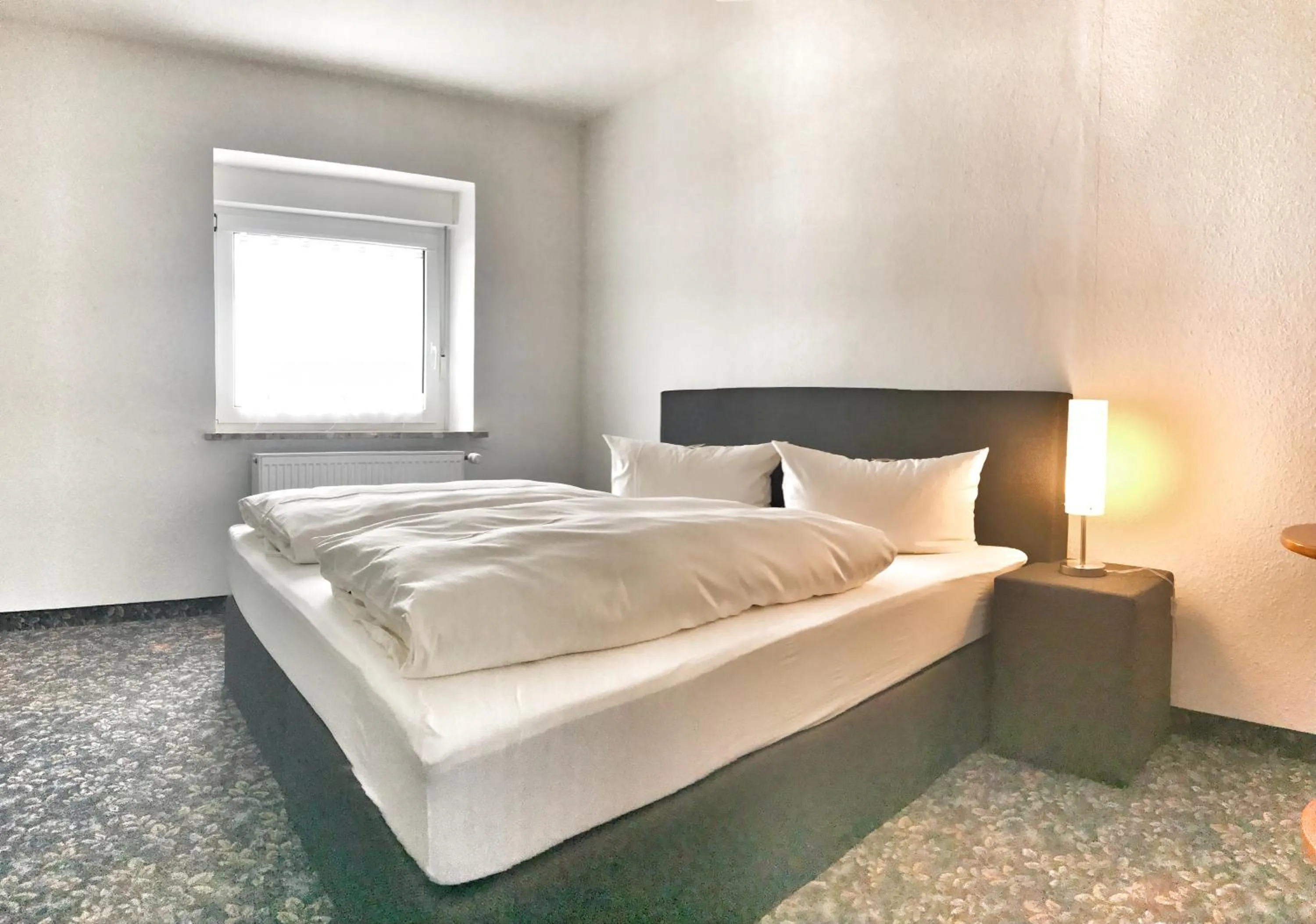 Photo of the whole room, Bed in Alpina Lodge Hotel Oberwiesenthal