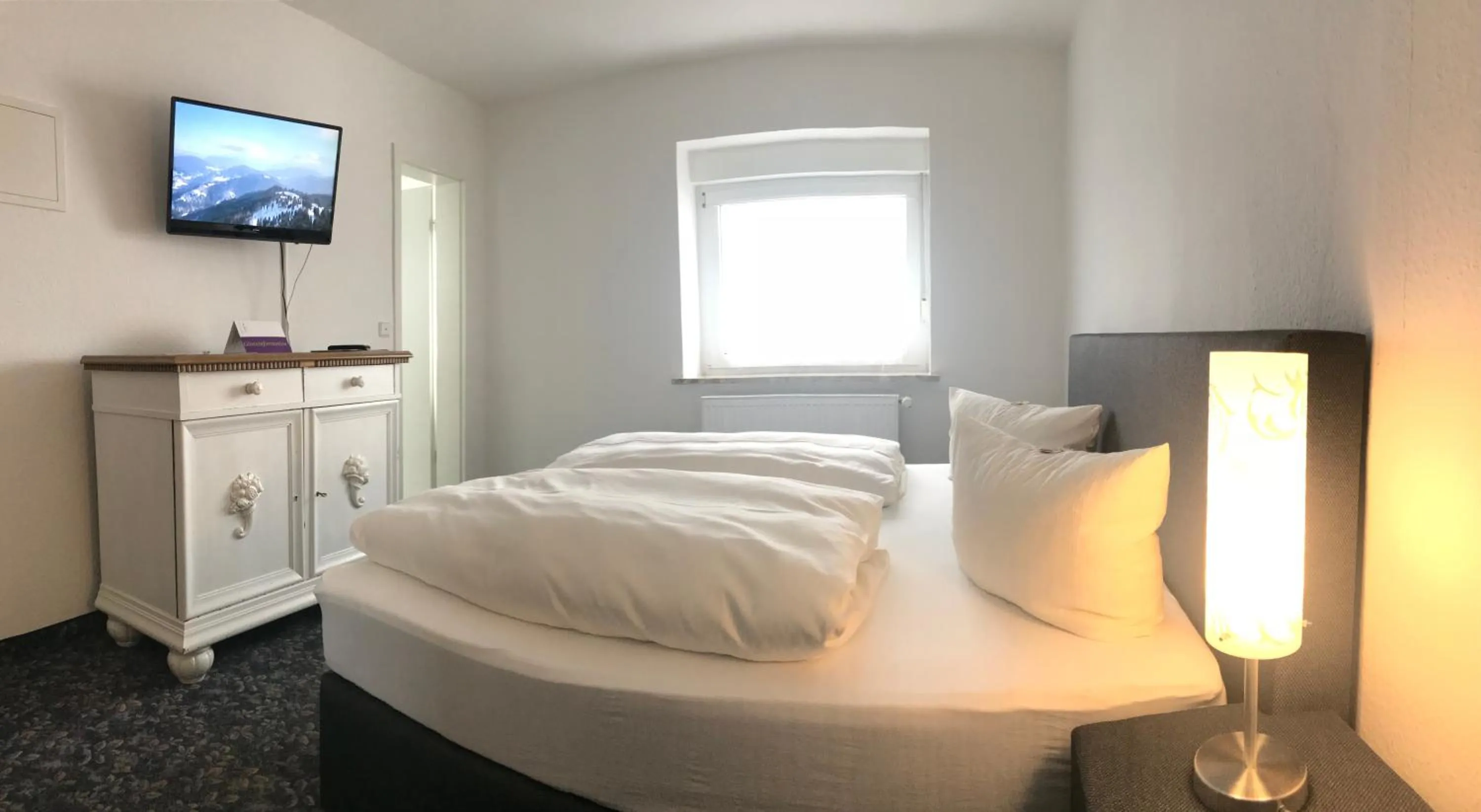 Photo of the whole room, Bed in Alpina Lodge Hotel Oberwiesenthal