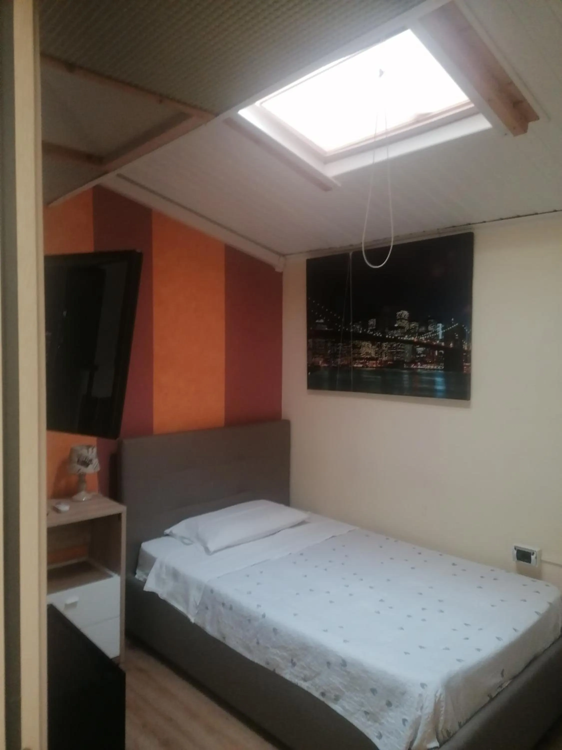 Bed in Hotel Lonatino