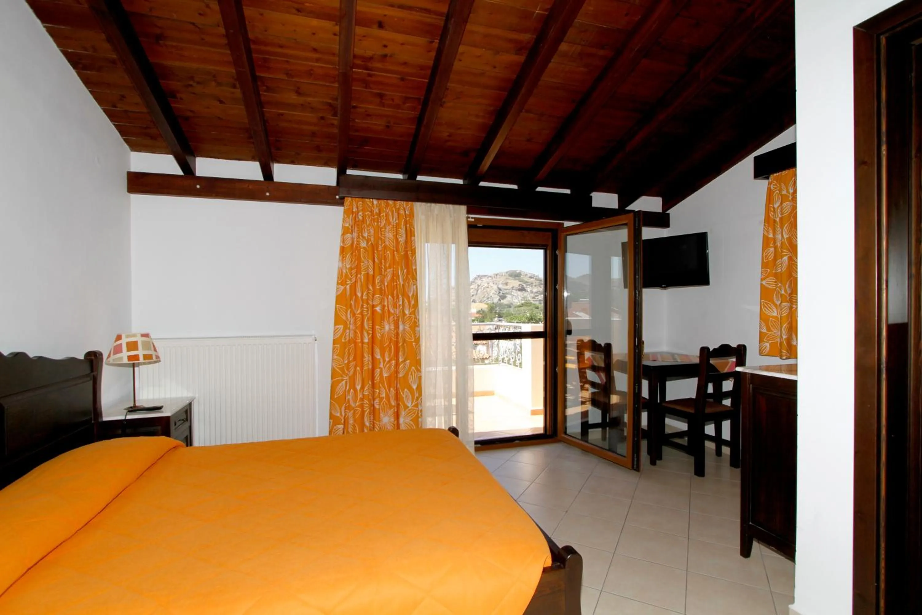 Dining area, Bed in Afrodite Hotel Apartments