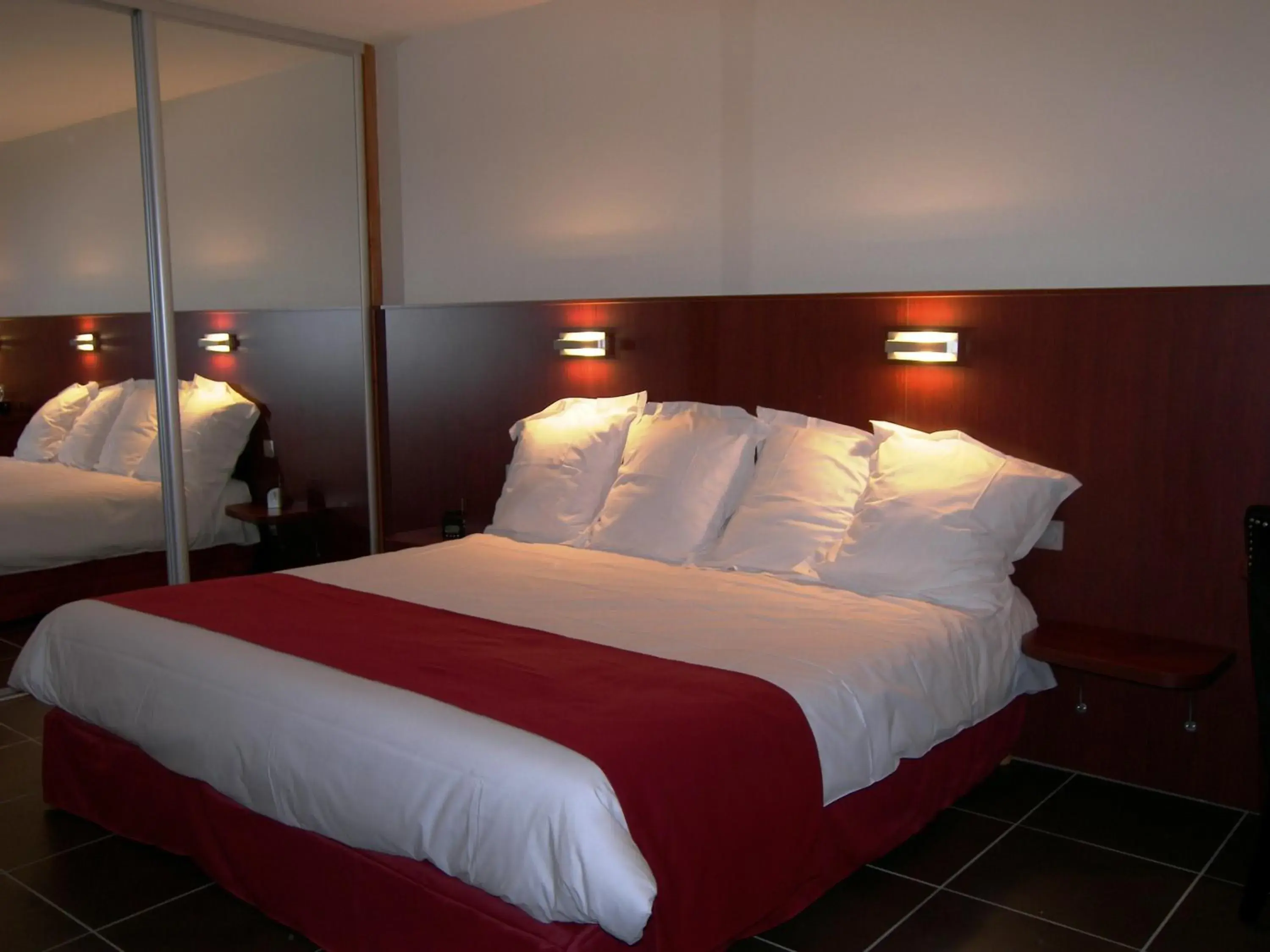 Bed in Hostellerie Del Matin Calme Bed in Hostellerie Del Matin Calme