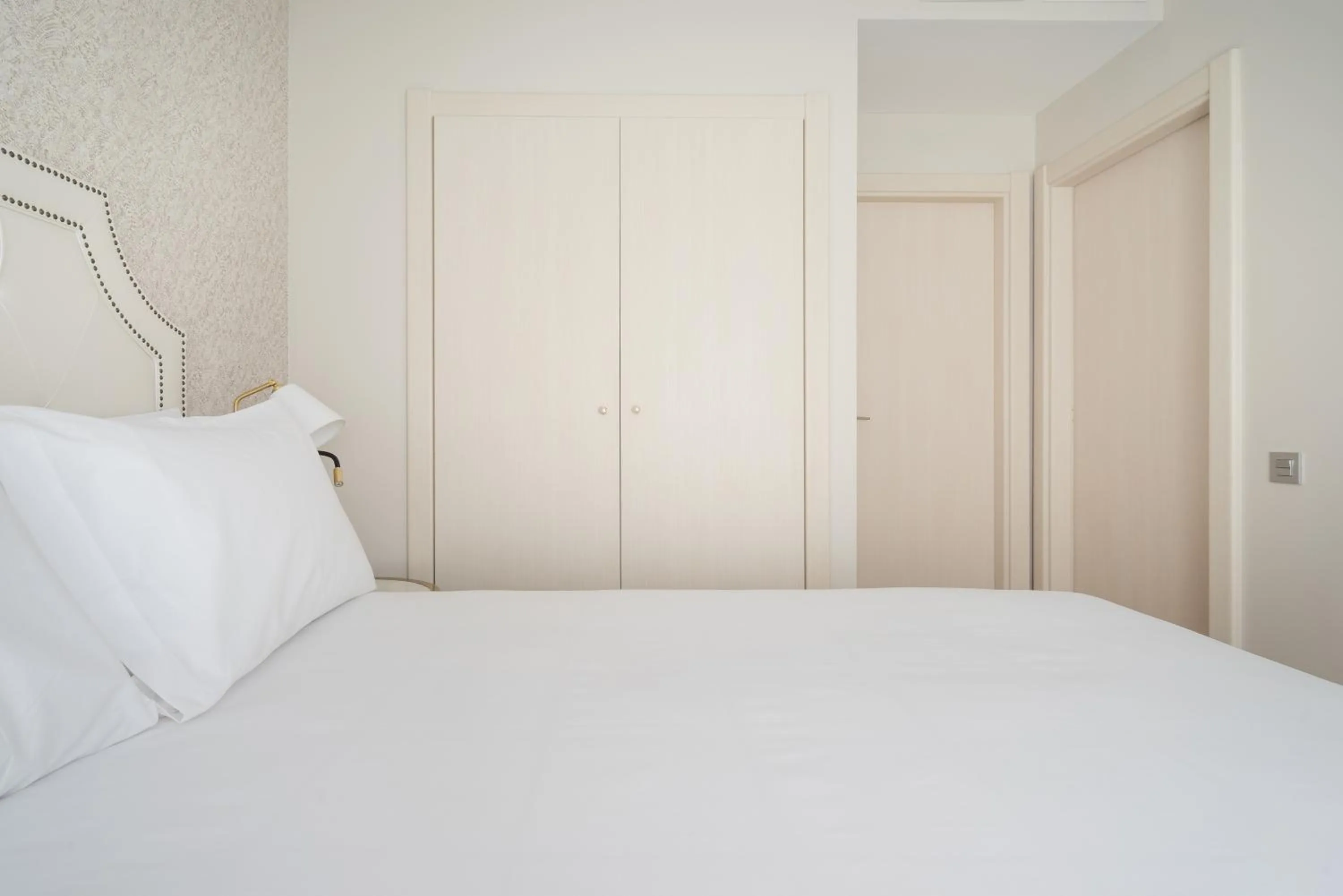 Bed in Tandem Soho Suites