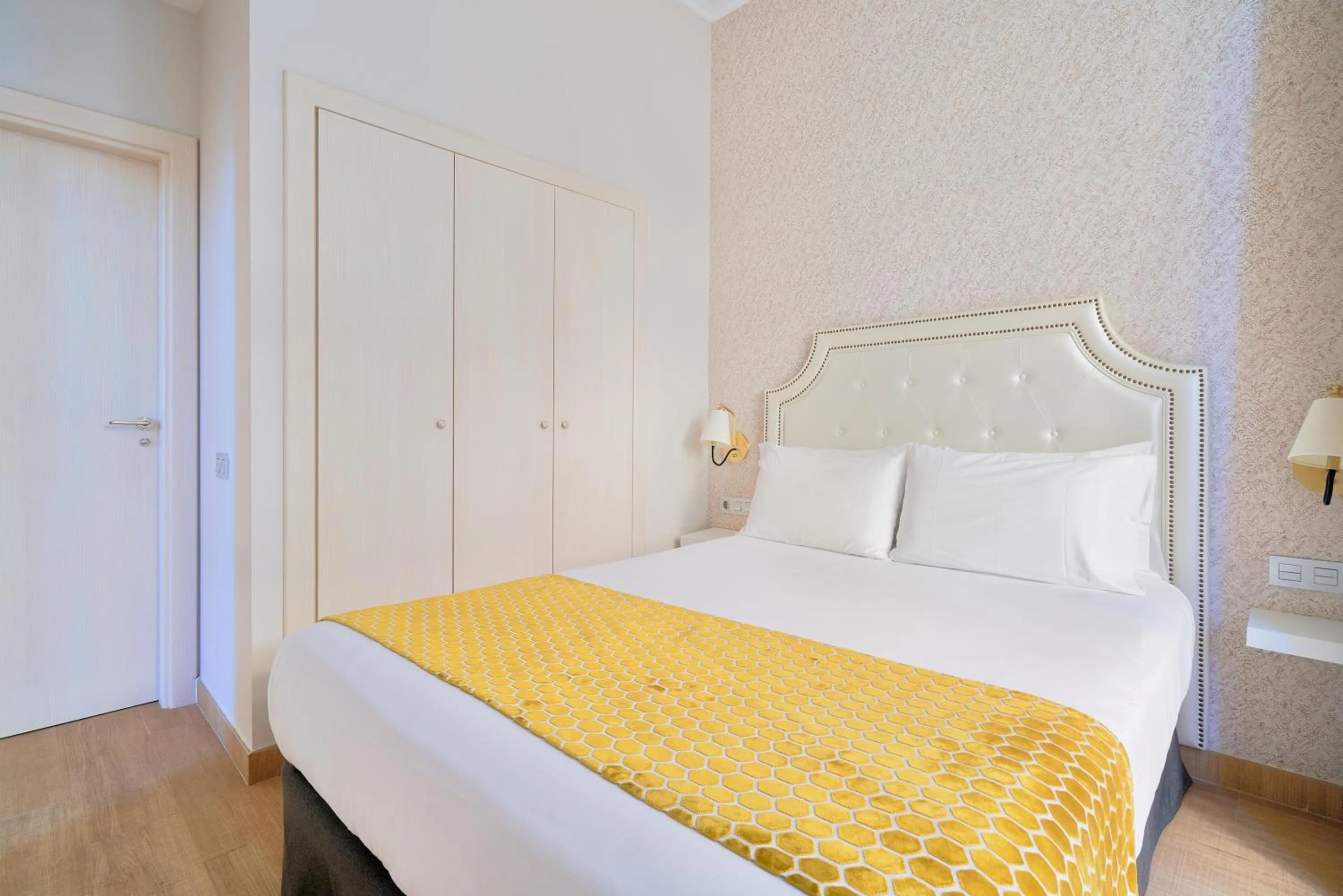 Bed in Tandem Soho Suites