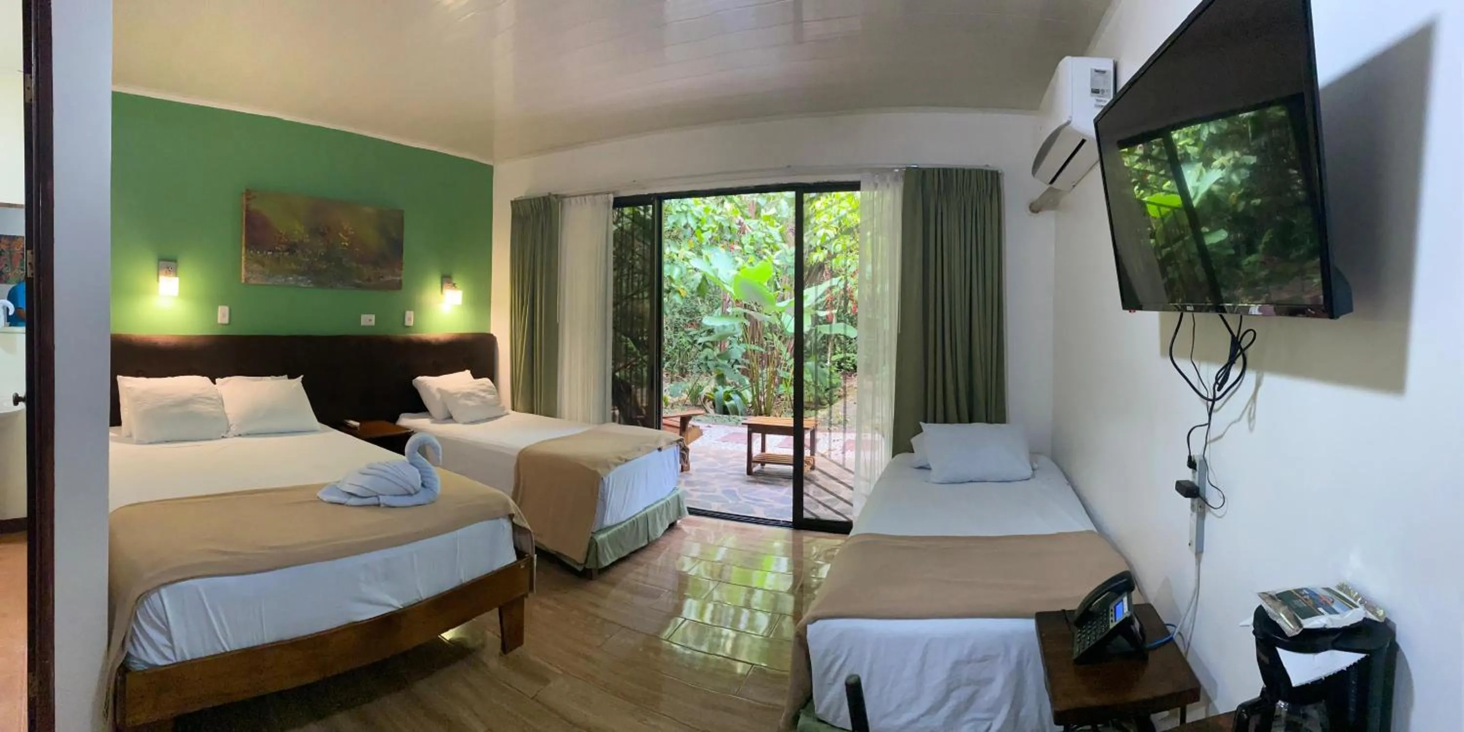 Bed in Tirimbina Rainforest Lodge