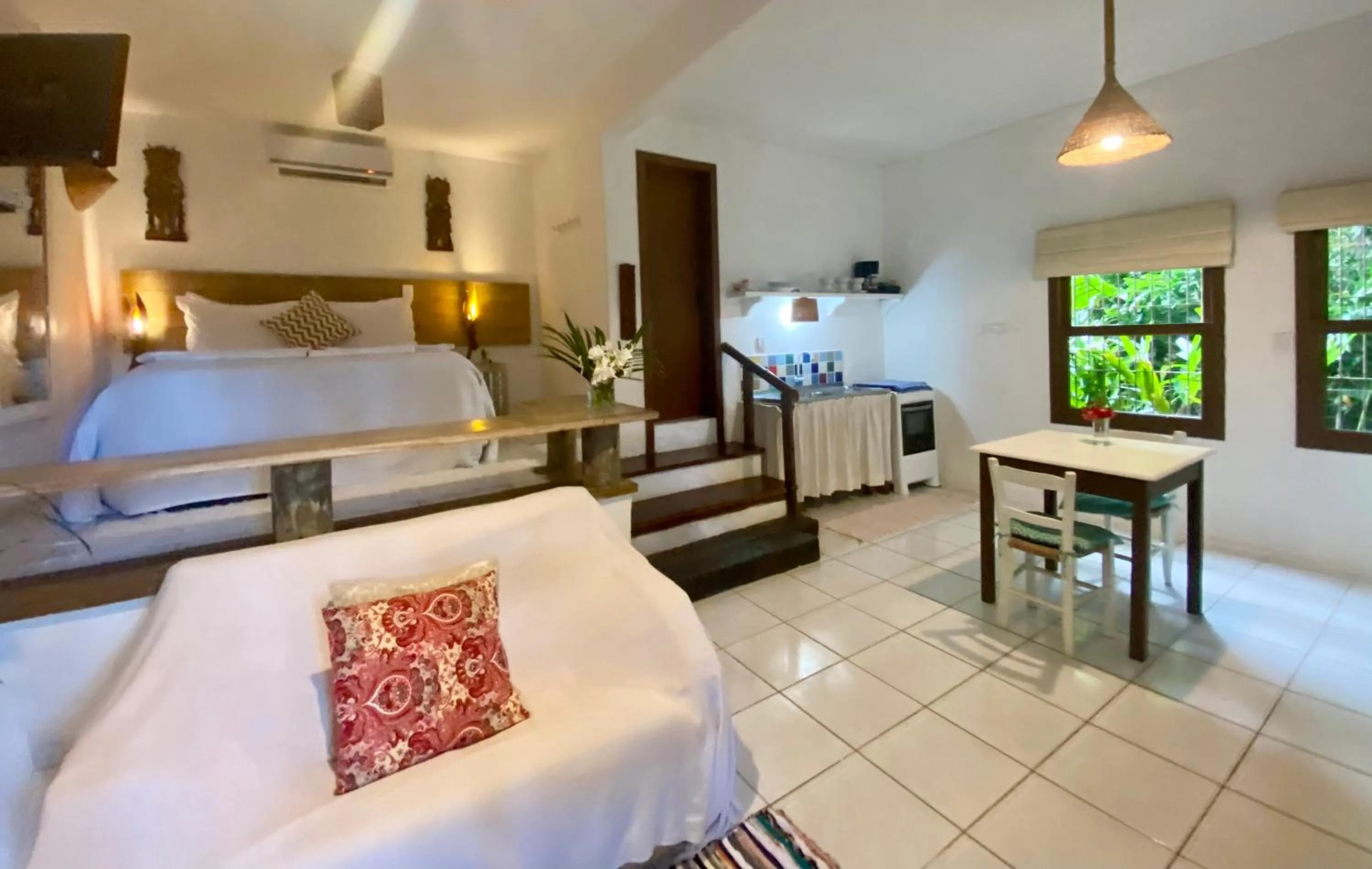 Bed in Pousada Bungalow